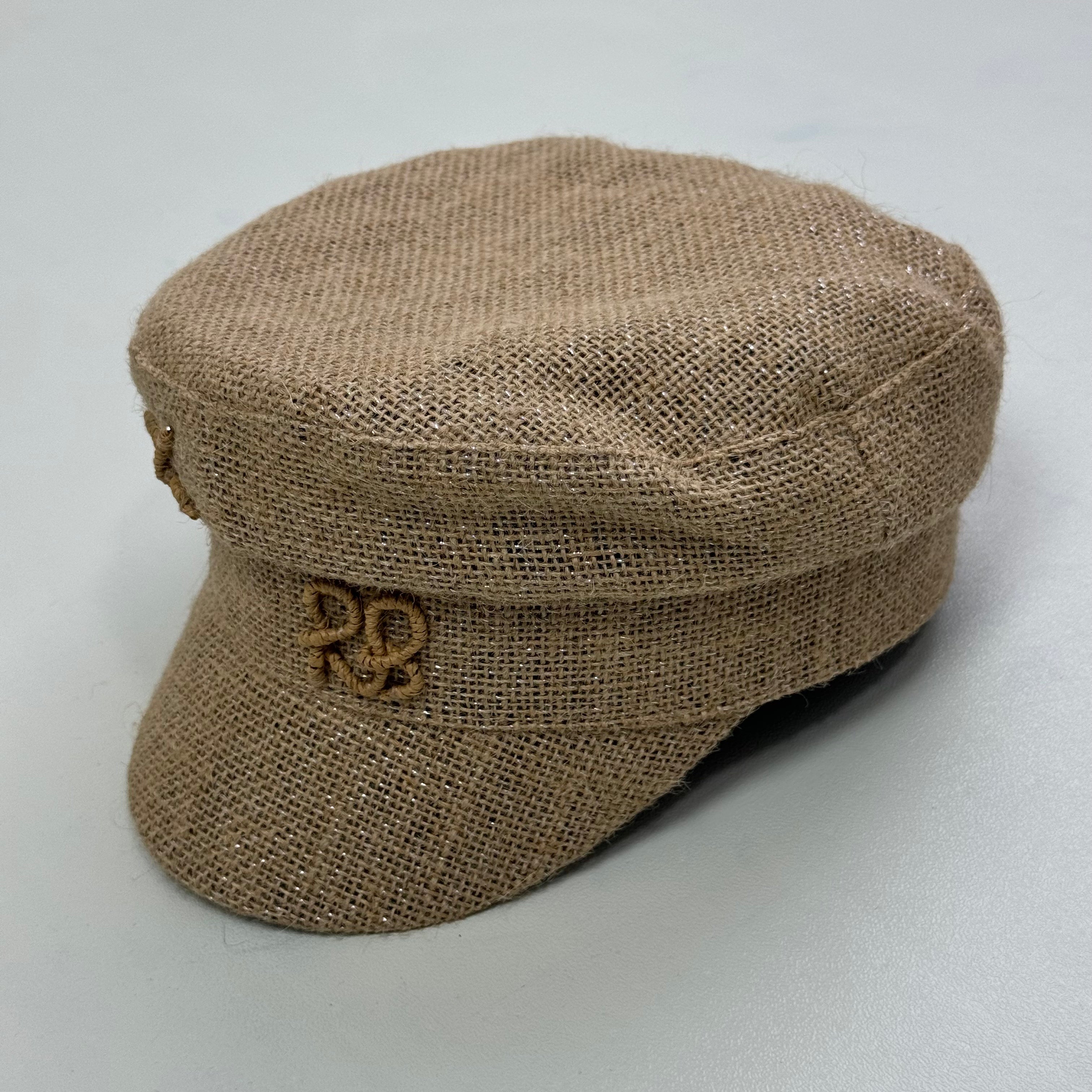 Woven straw cap with a flat top