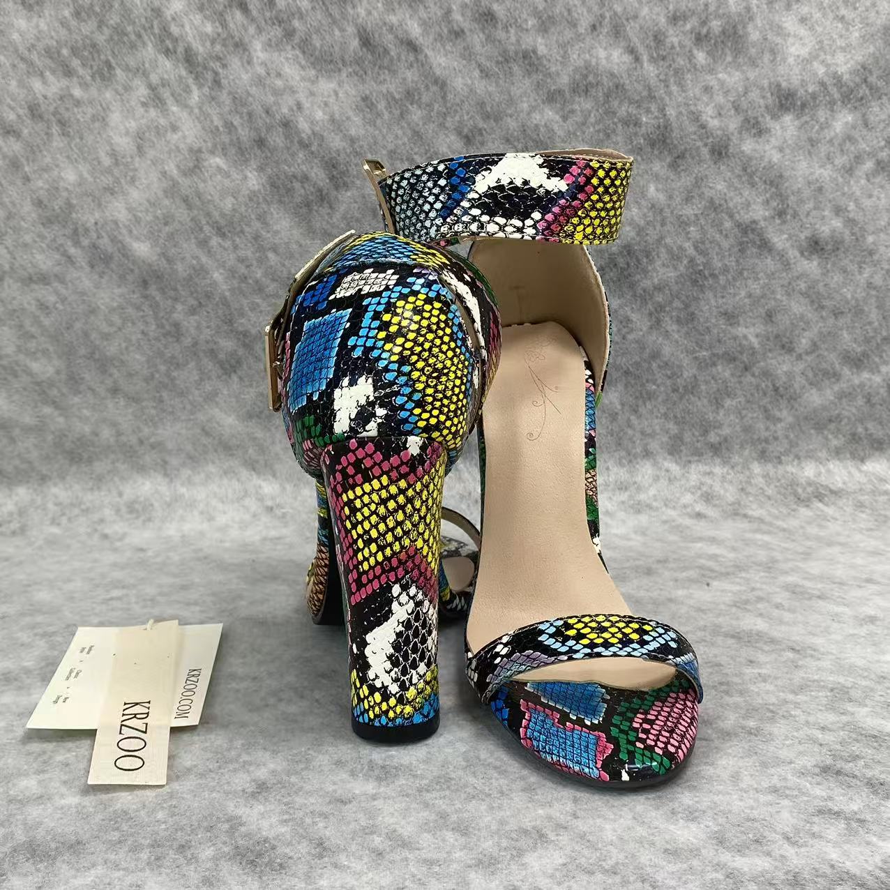 Snake-patterned chunky heels