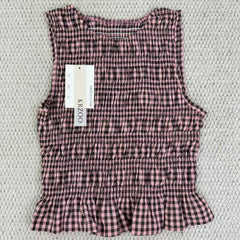 A sleeveless front-back vest