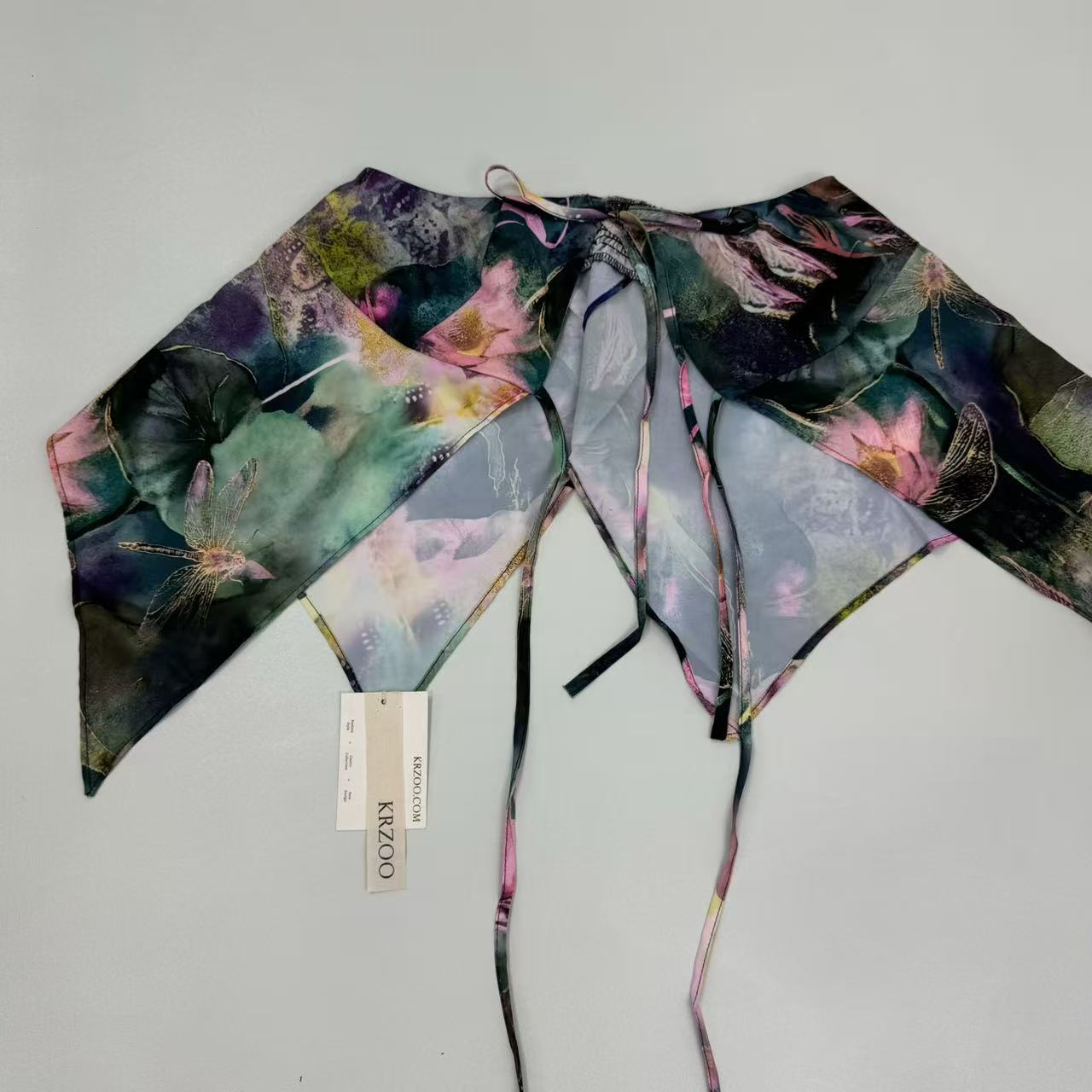 Strappy printed halter-necked frilled top with ties
