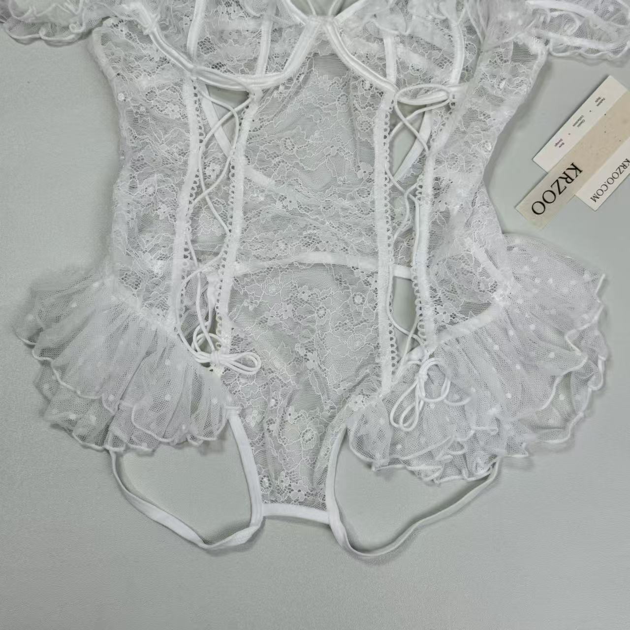 Backless and low-cut one-piece net-sheer uniform set