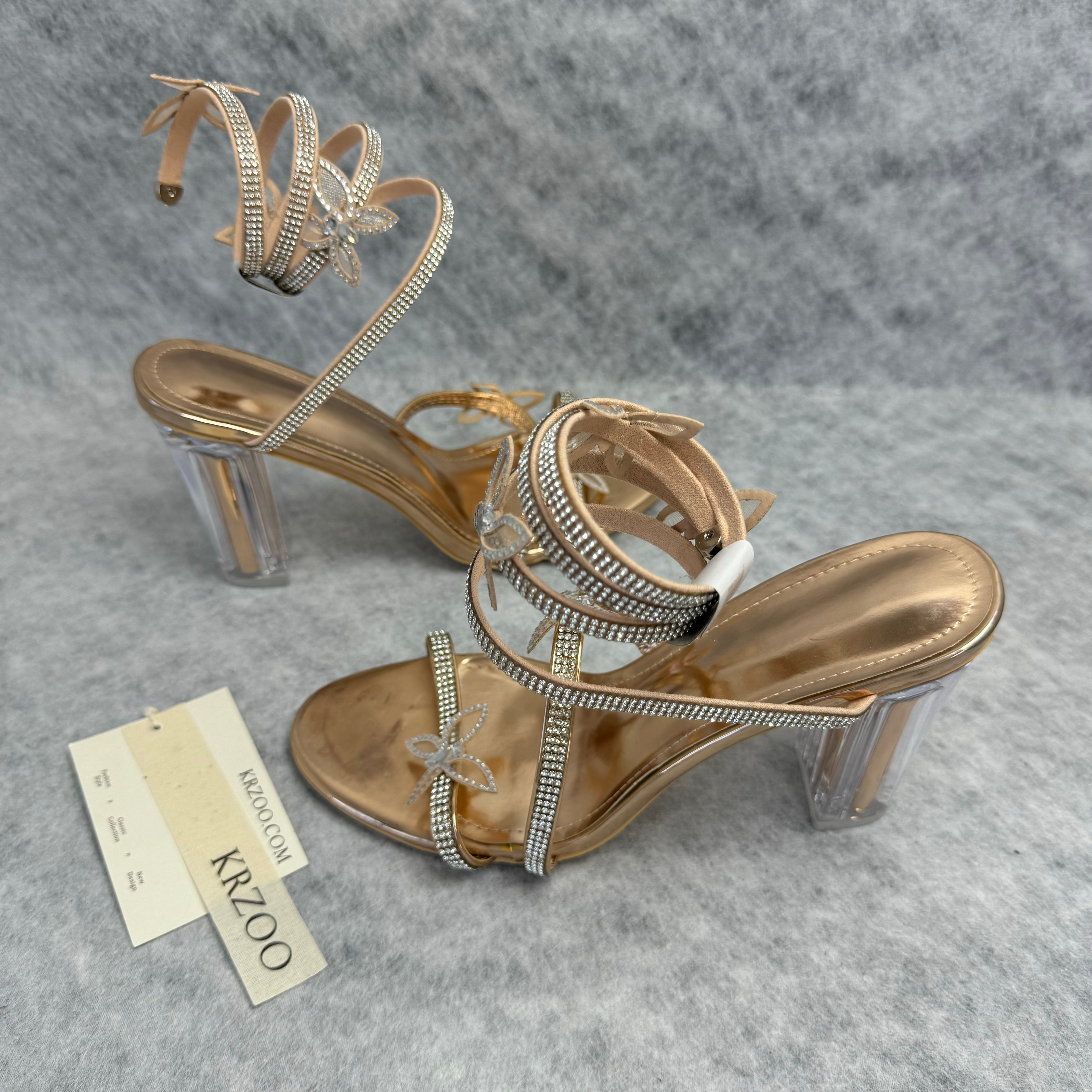 Serpentine-wrapped butterfly platform heels