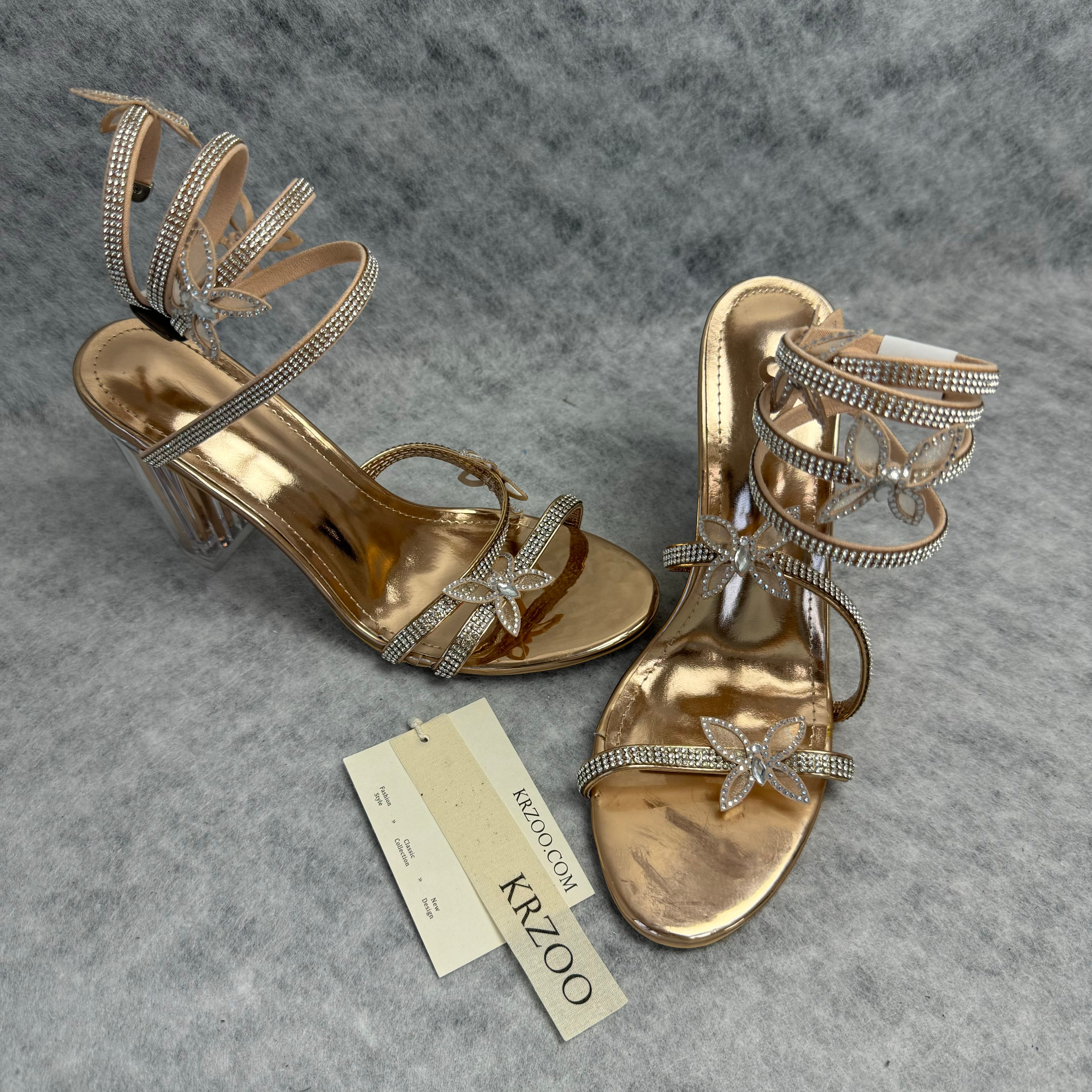 Serpentine-wrapped butterfly platform heels