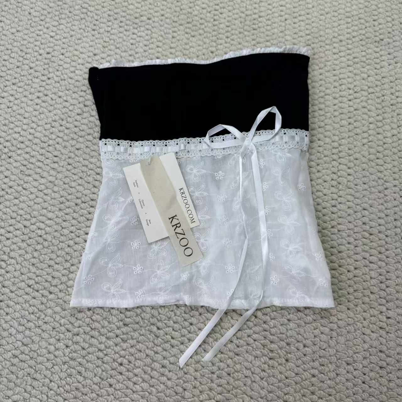 Wrap-around bodice with one shoulder opening
