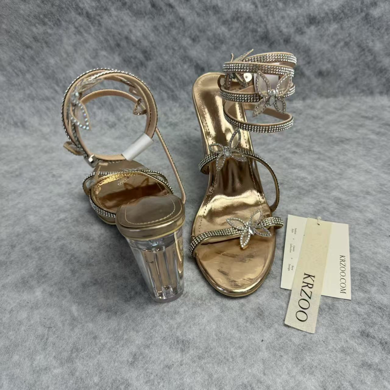 Serpentine-wrapped butterfly platform heels