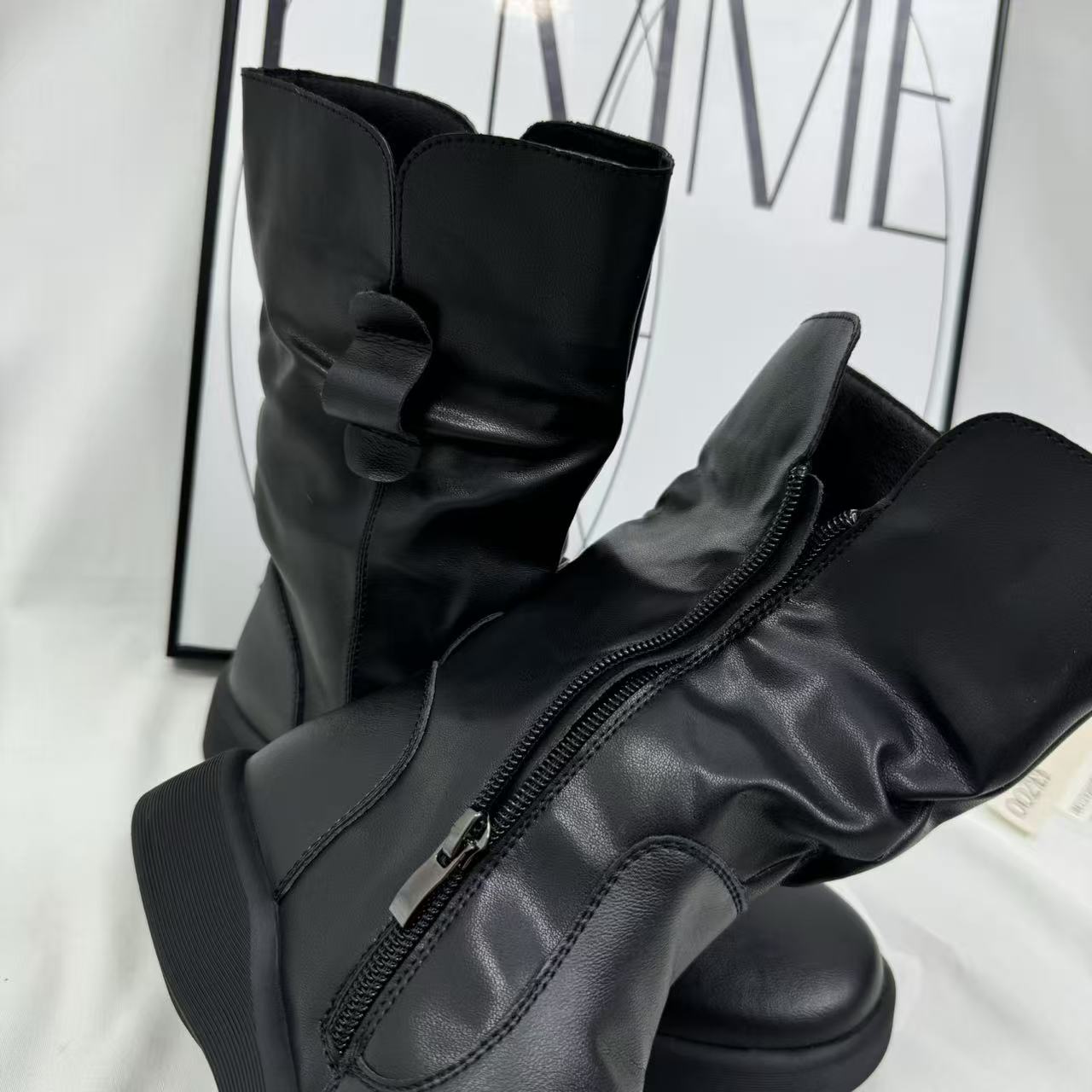 Ruffled side-zip ankle boots