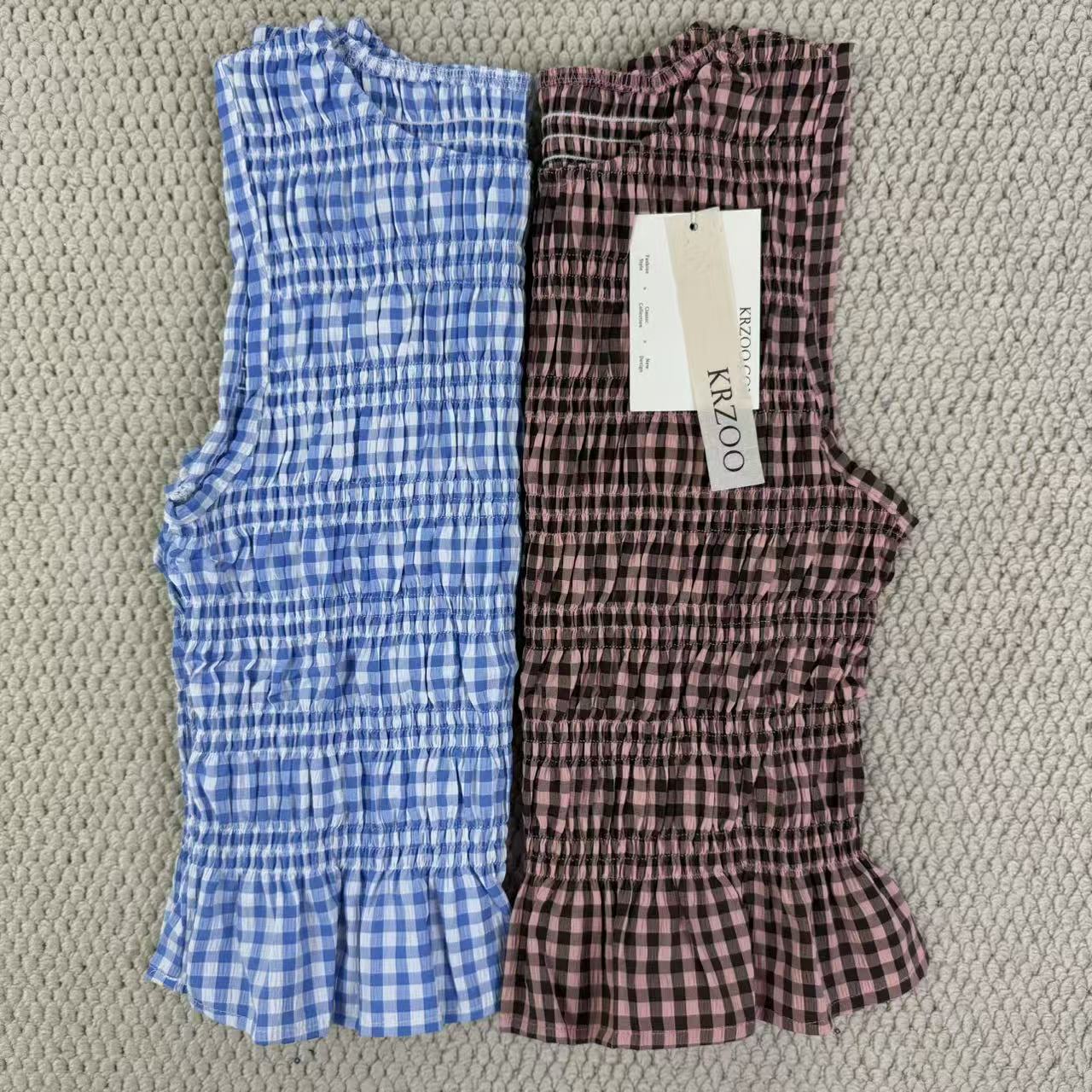 A sleeveless front-back vest