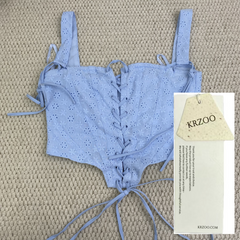 Zippered bodice with fishbone belt top garment