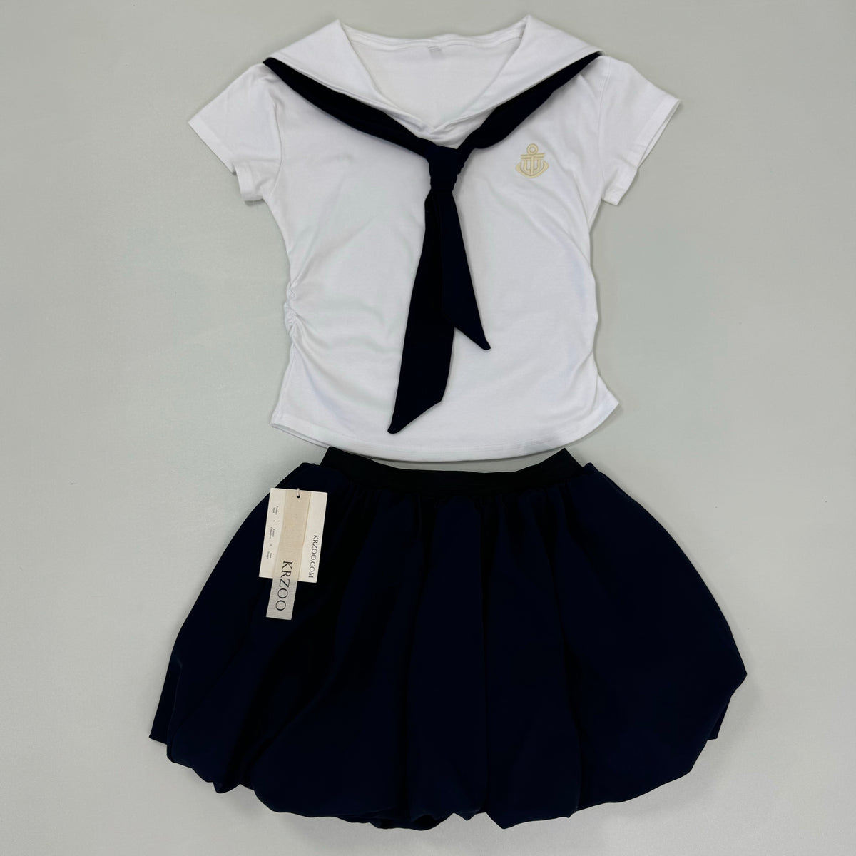 Two navy short-sleeved skirt in a set