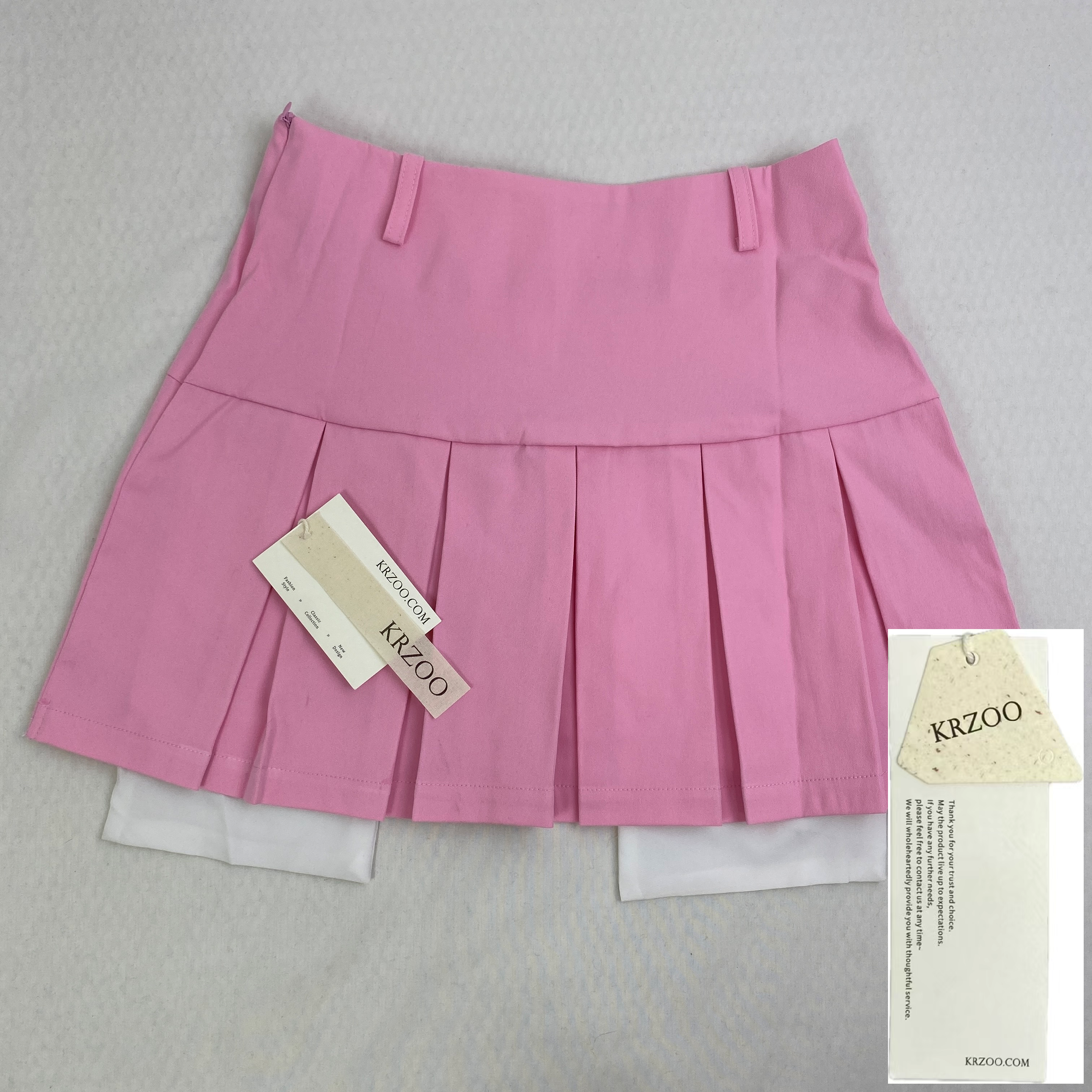 Pleated slit pocket mini skirt