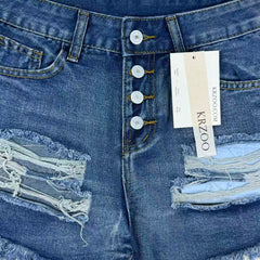 Hole-rimmed fringed denim shorts