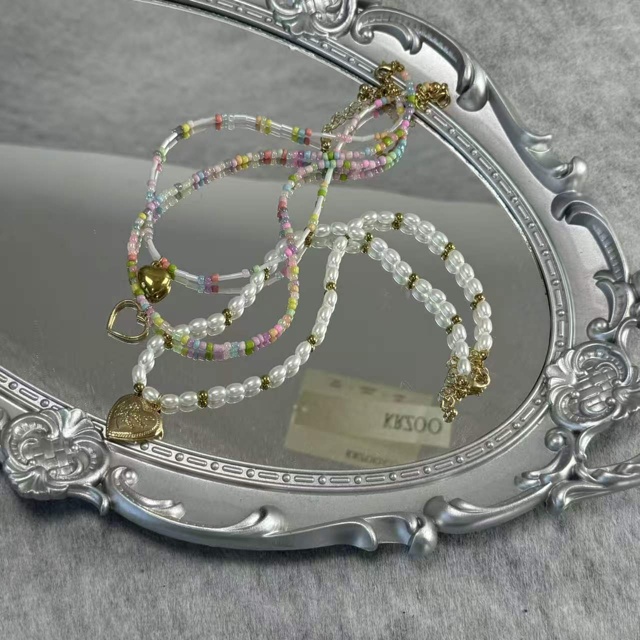 Love charm pendant string of pearls collar chain