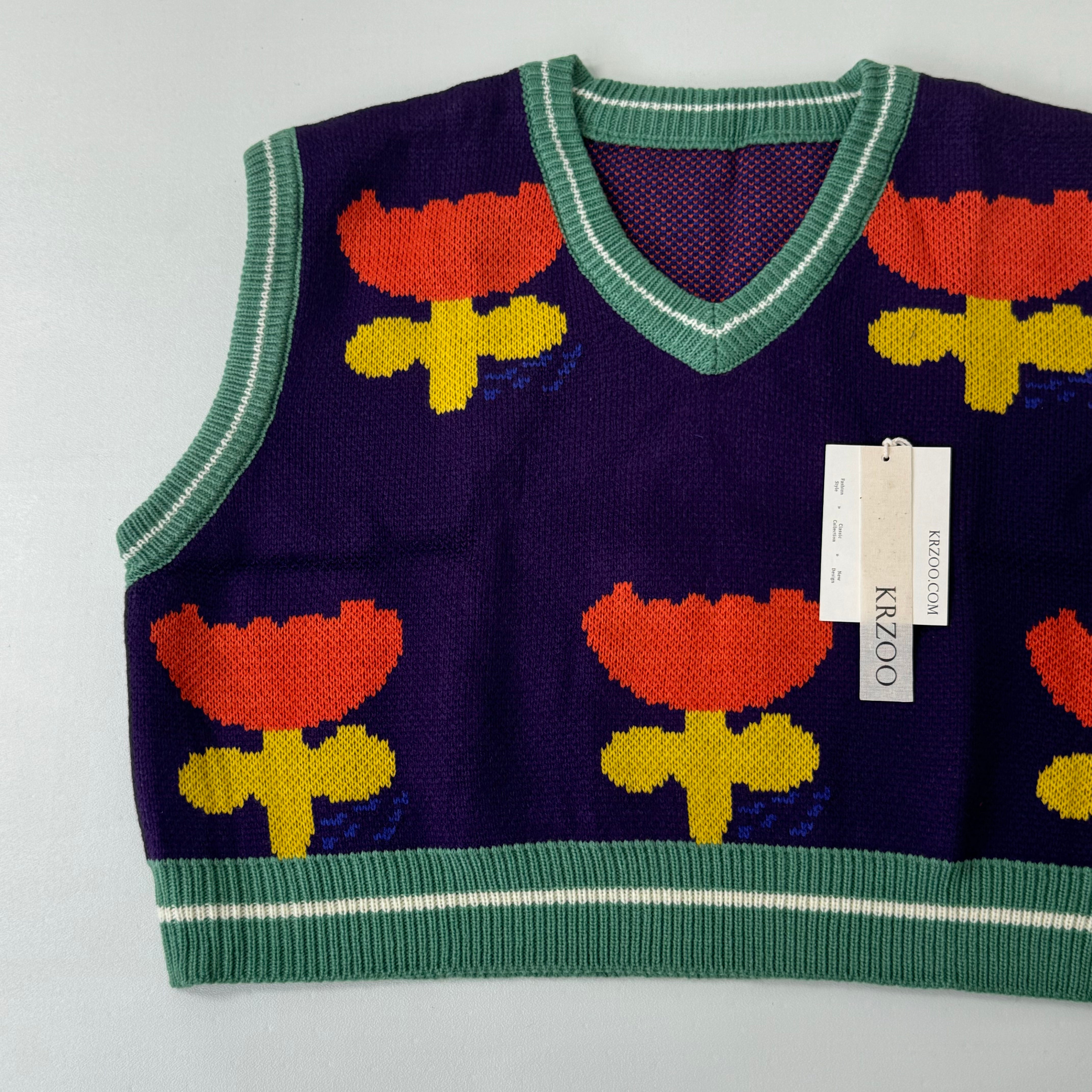 Purple embroidered sweater vest
