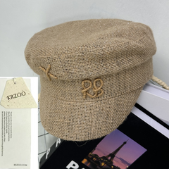 Woven straw cap with a flat top