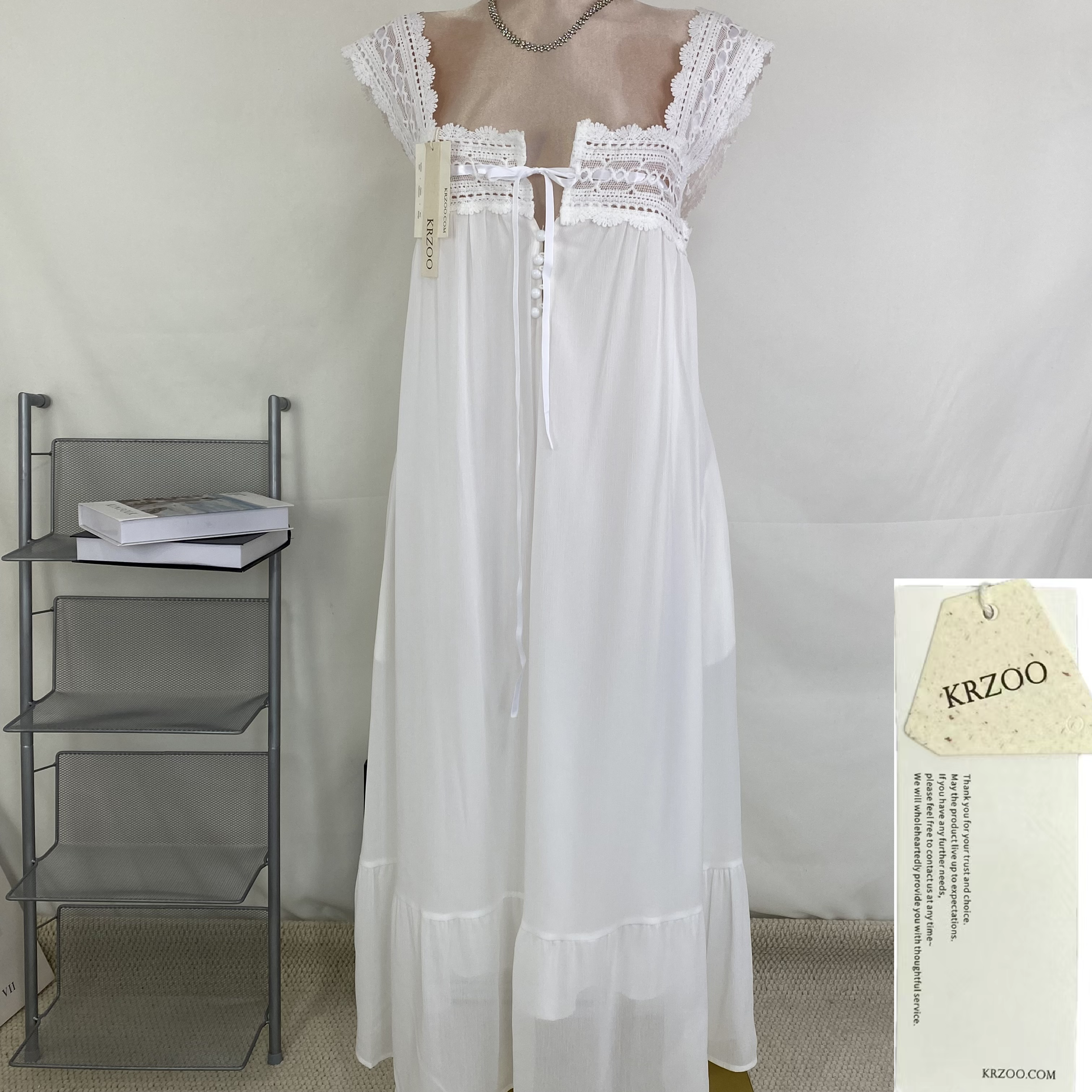 Solid color lace-trimmed sleeveless dress