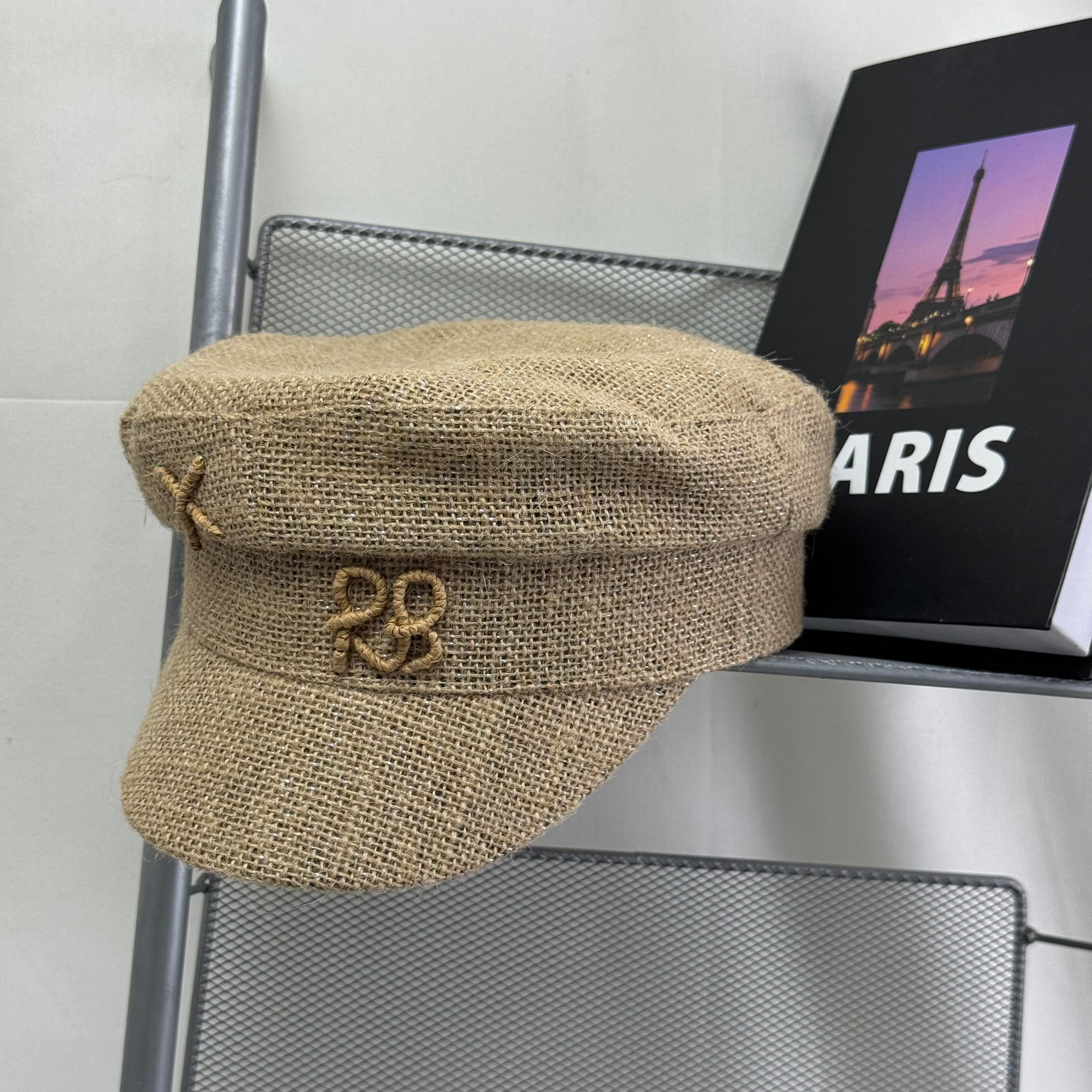 Woven straw cap with a flat top