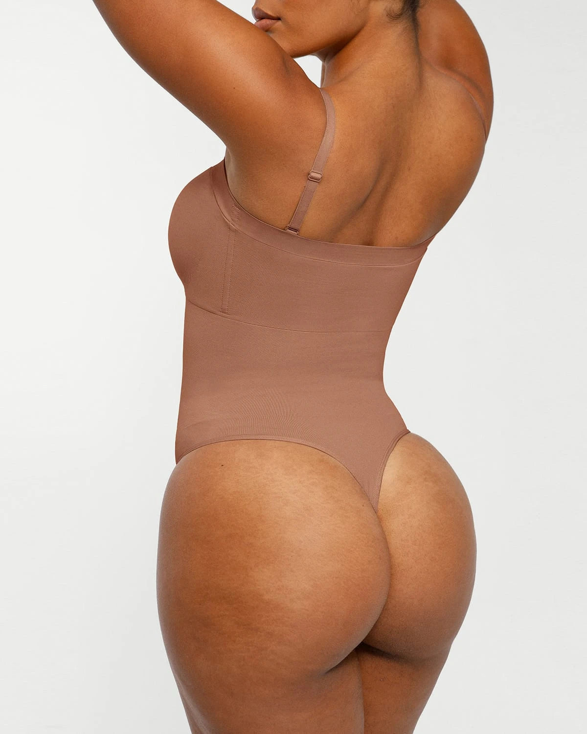 Bare Essentialsâ„?Skin Flow Strapless Sculpt Thong Bodysuit