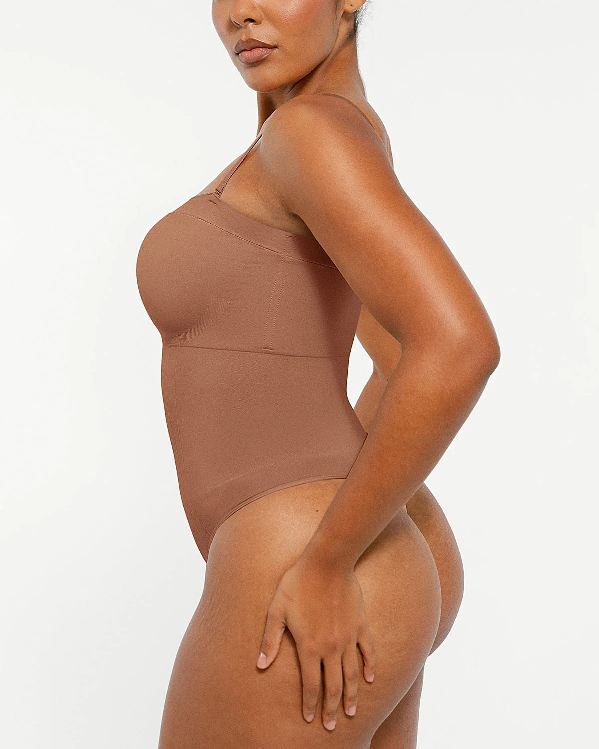 Bare Essentialsâ„?Skin Flow Strapless Sculpt Thong Bodysuit