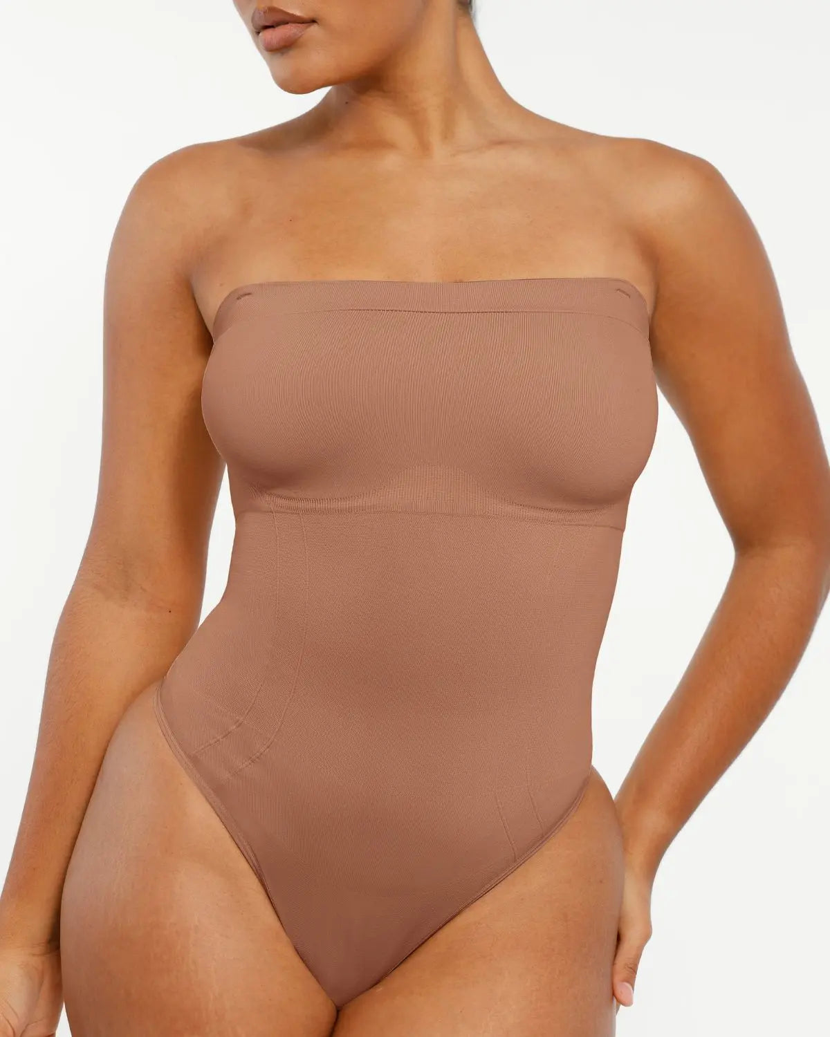 Bare Essentialsâ„?Skin Flow Strapless Sculpt Thong Bodysuit