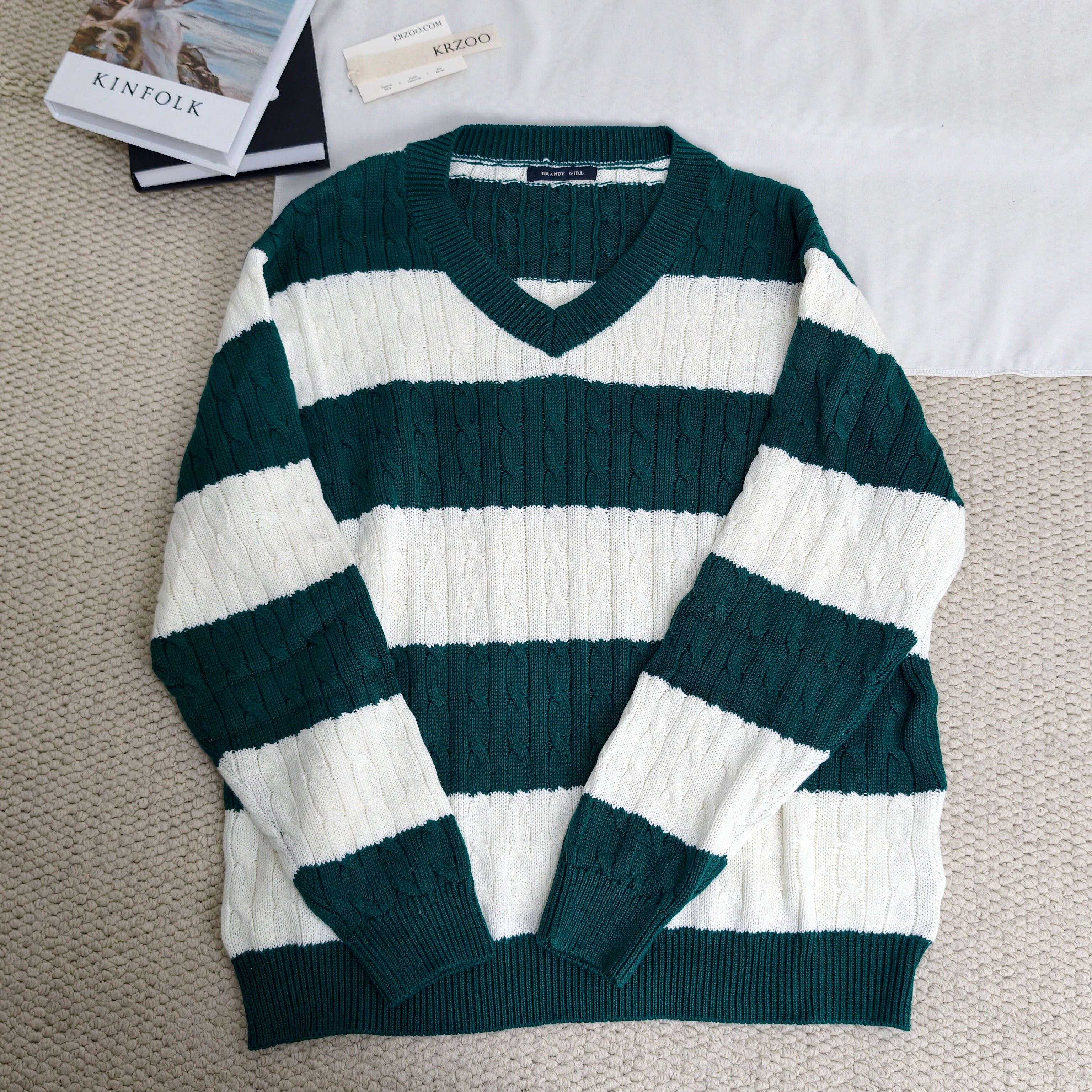 Striped twisted V-neck knitted sweater