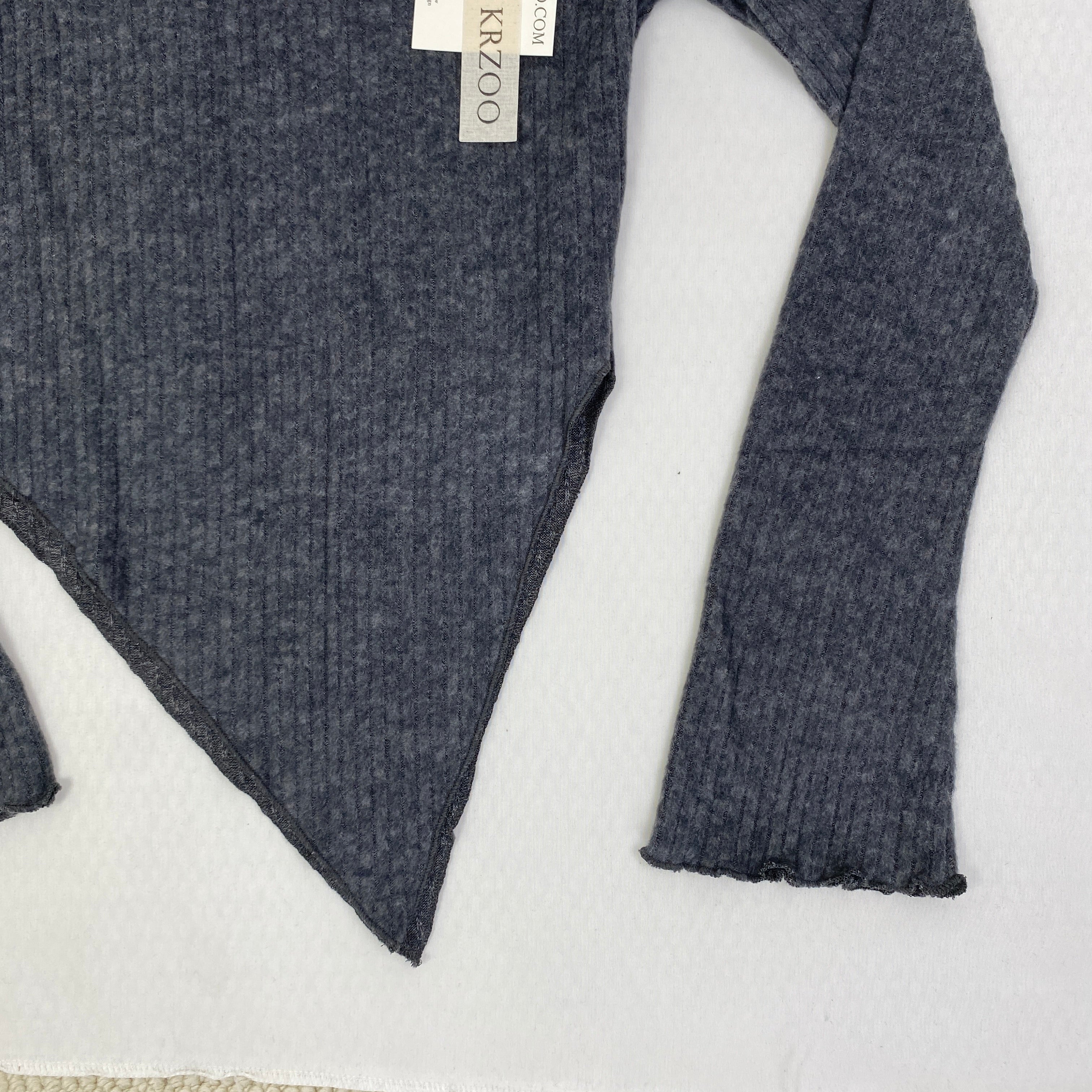 Irregularly cut, flared collar top