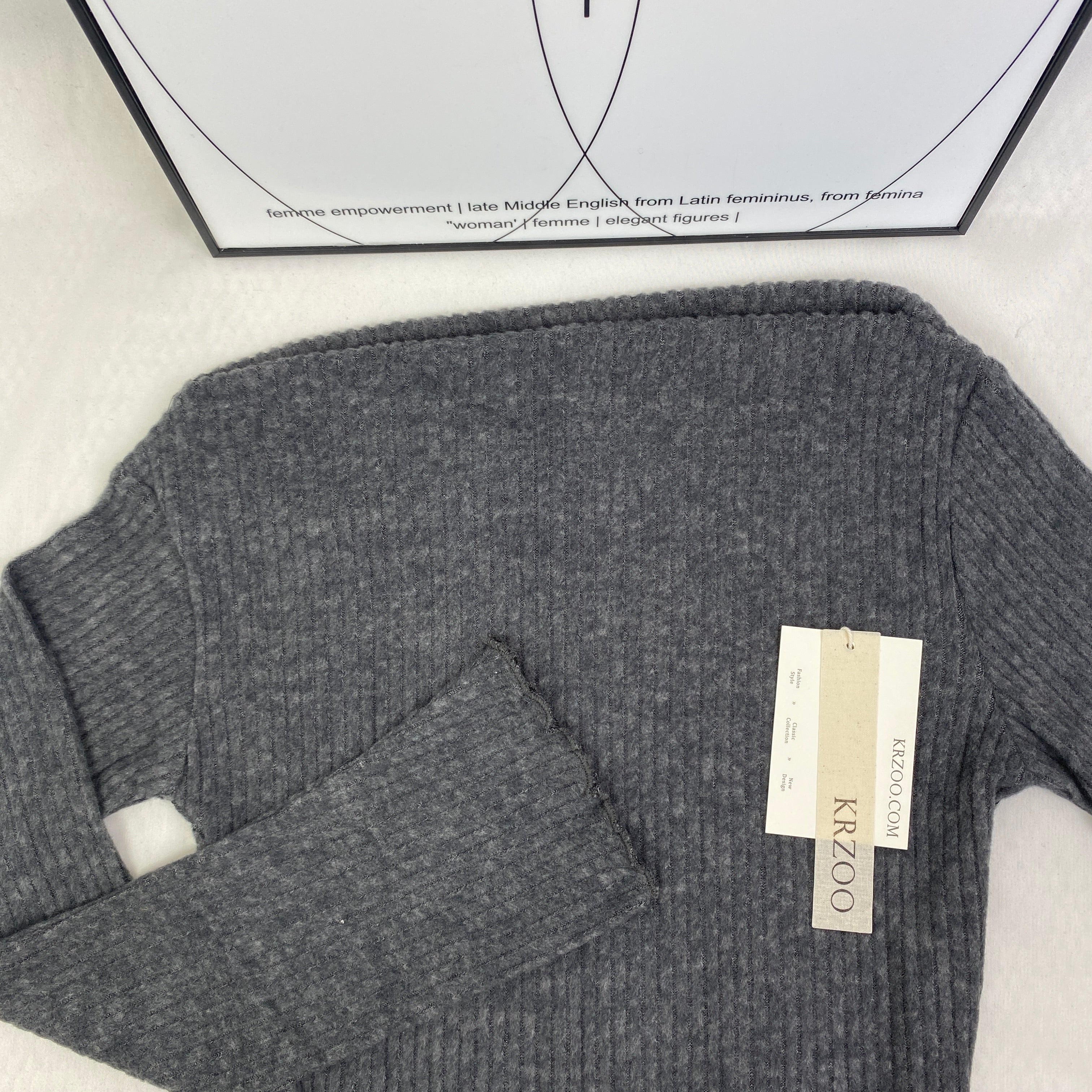 Irregularly cut, flared collar top