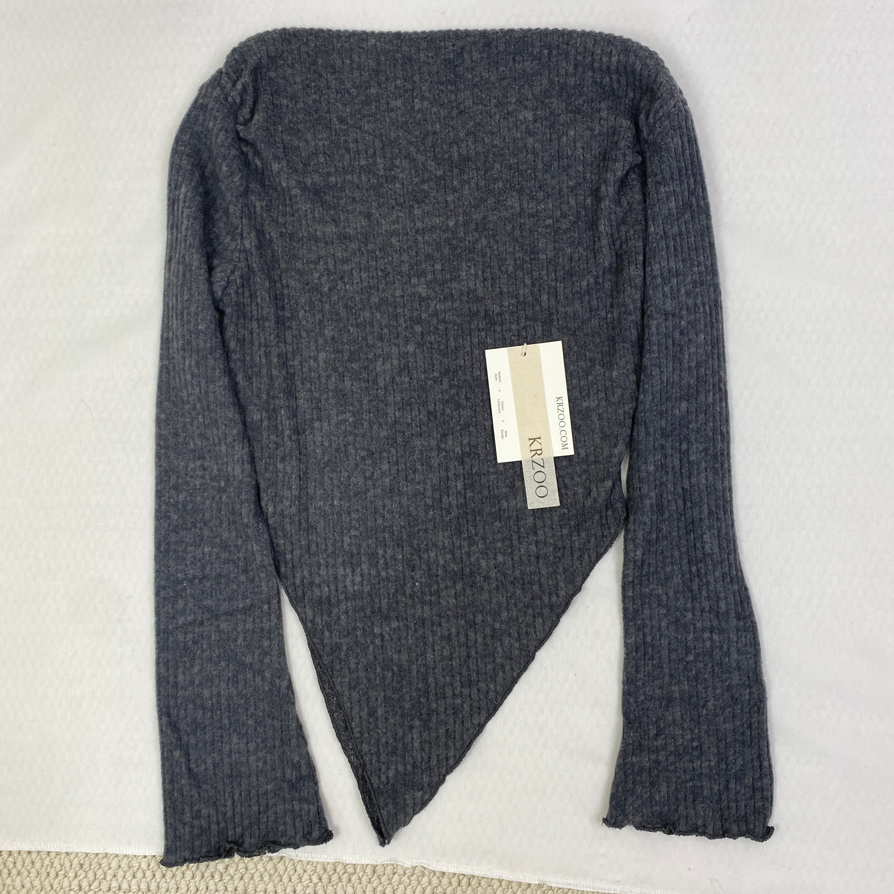 Irregularly cut, flared collar top