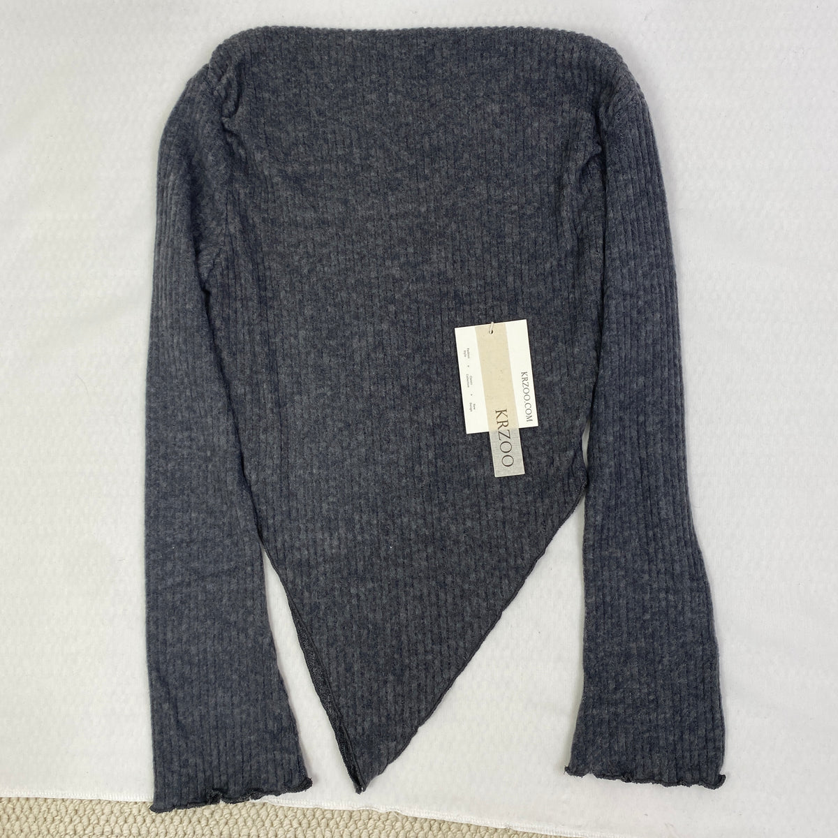 Irregularly cut, flared collar top