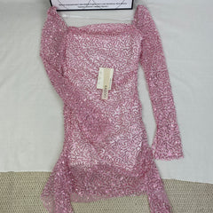 A slimming, soft pink, figure-hugging dress