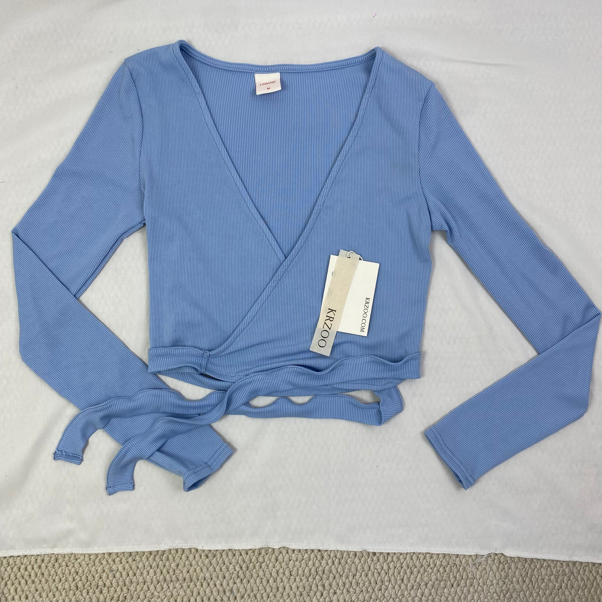 Solid-color V-neck strap long-sleeved top