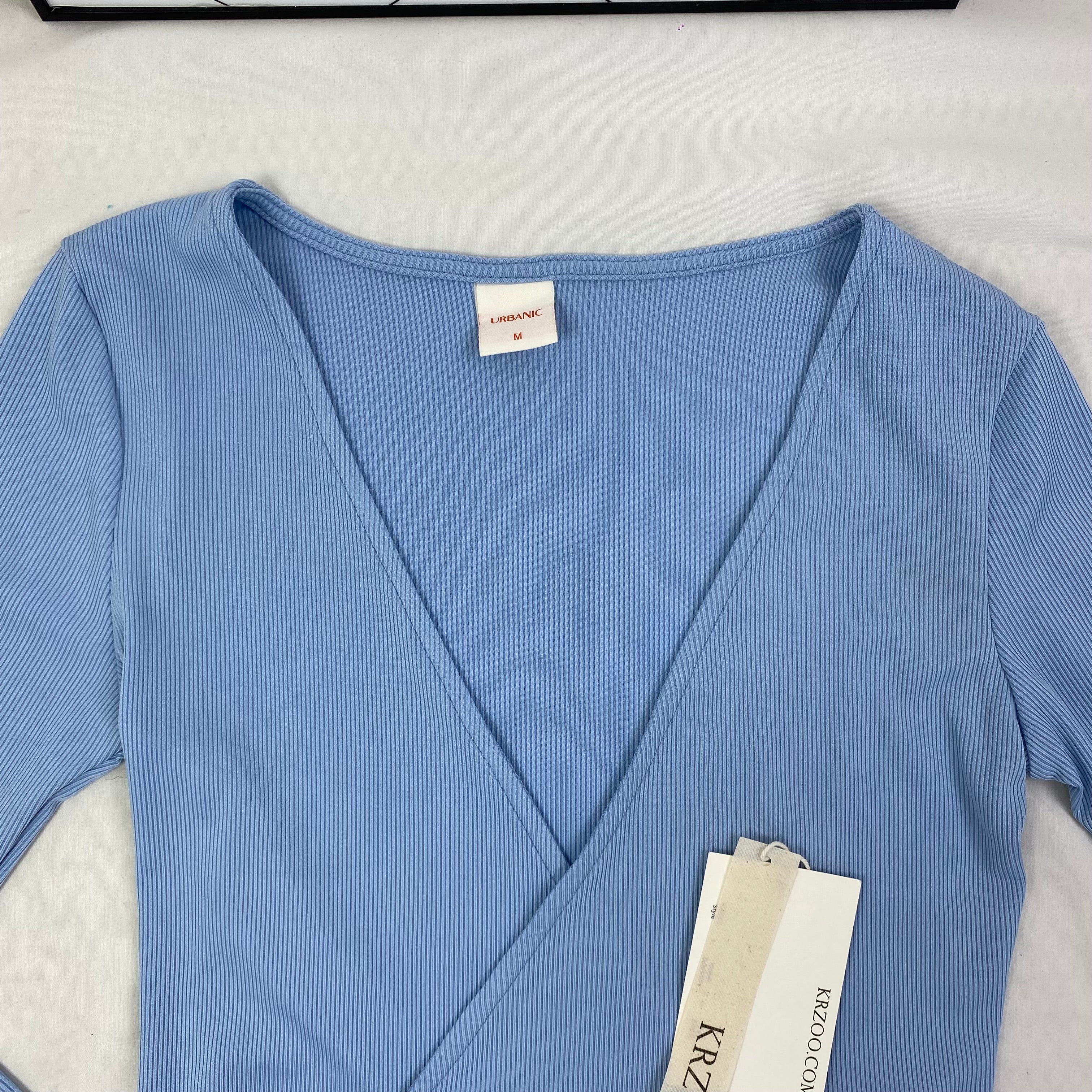 Solid-color V-neck strap long-sleeved top