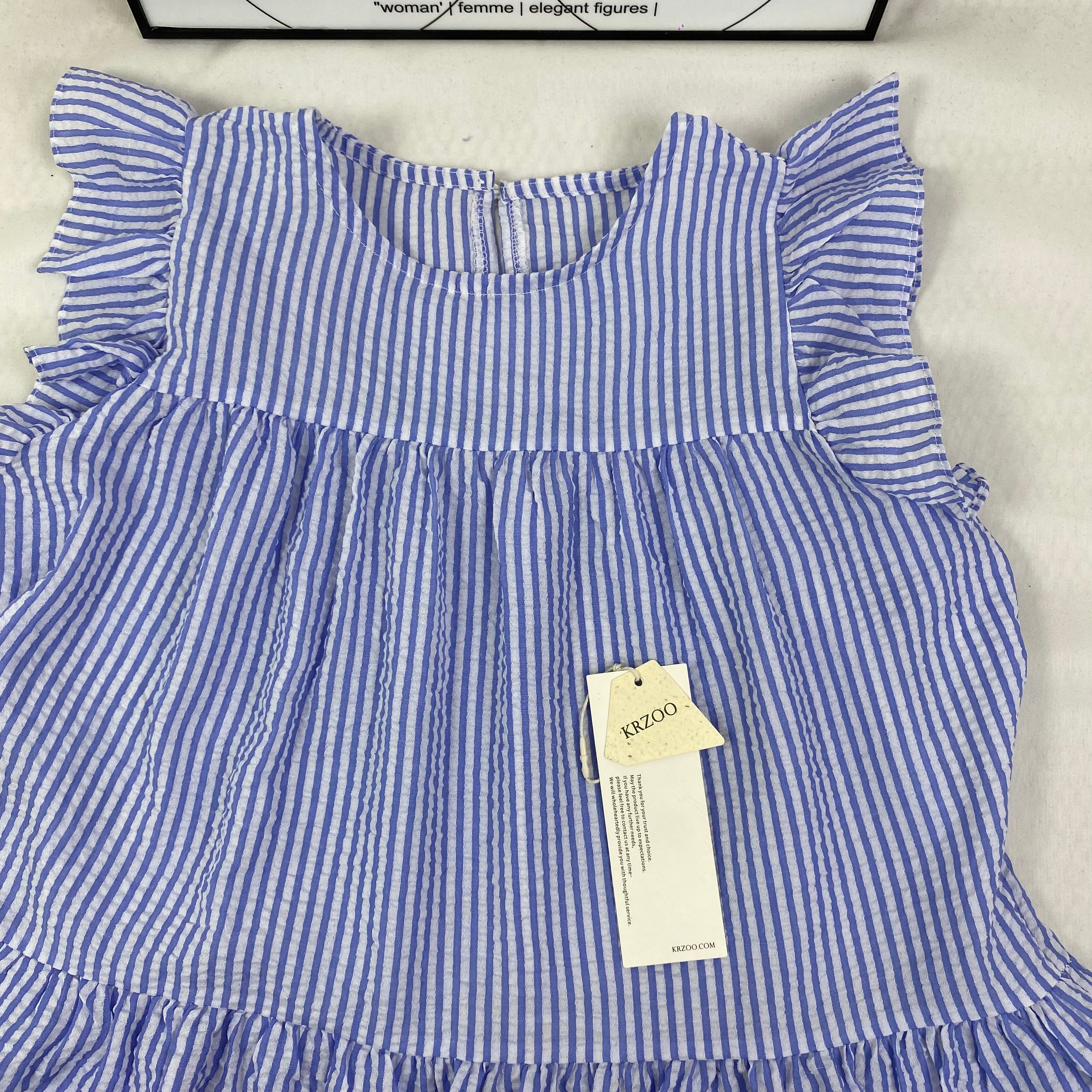 Blue and white thin striped sleeveless shirt