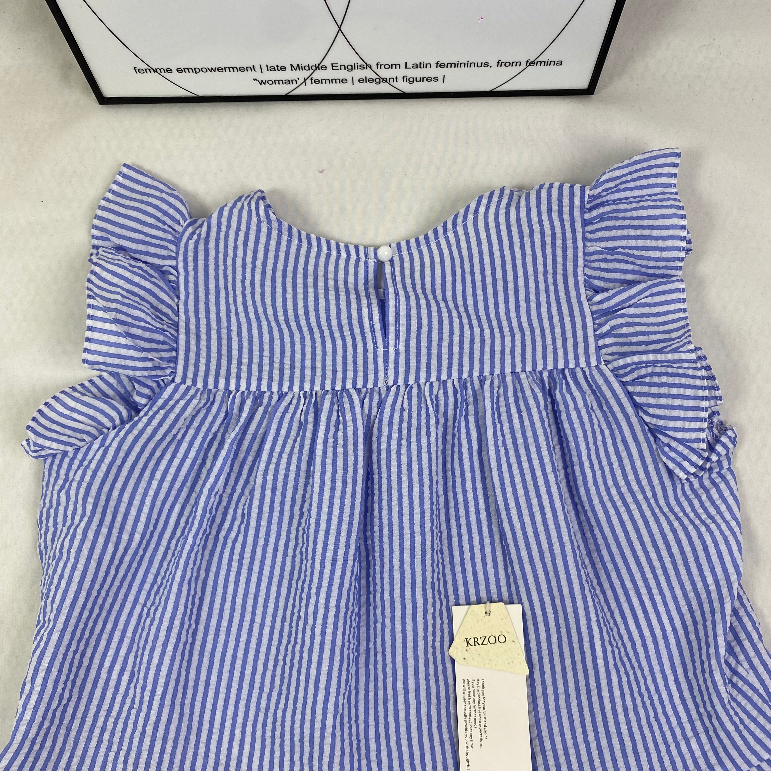 Blue and white thin striped sleeveless shirt