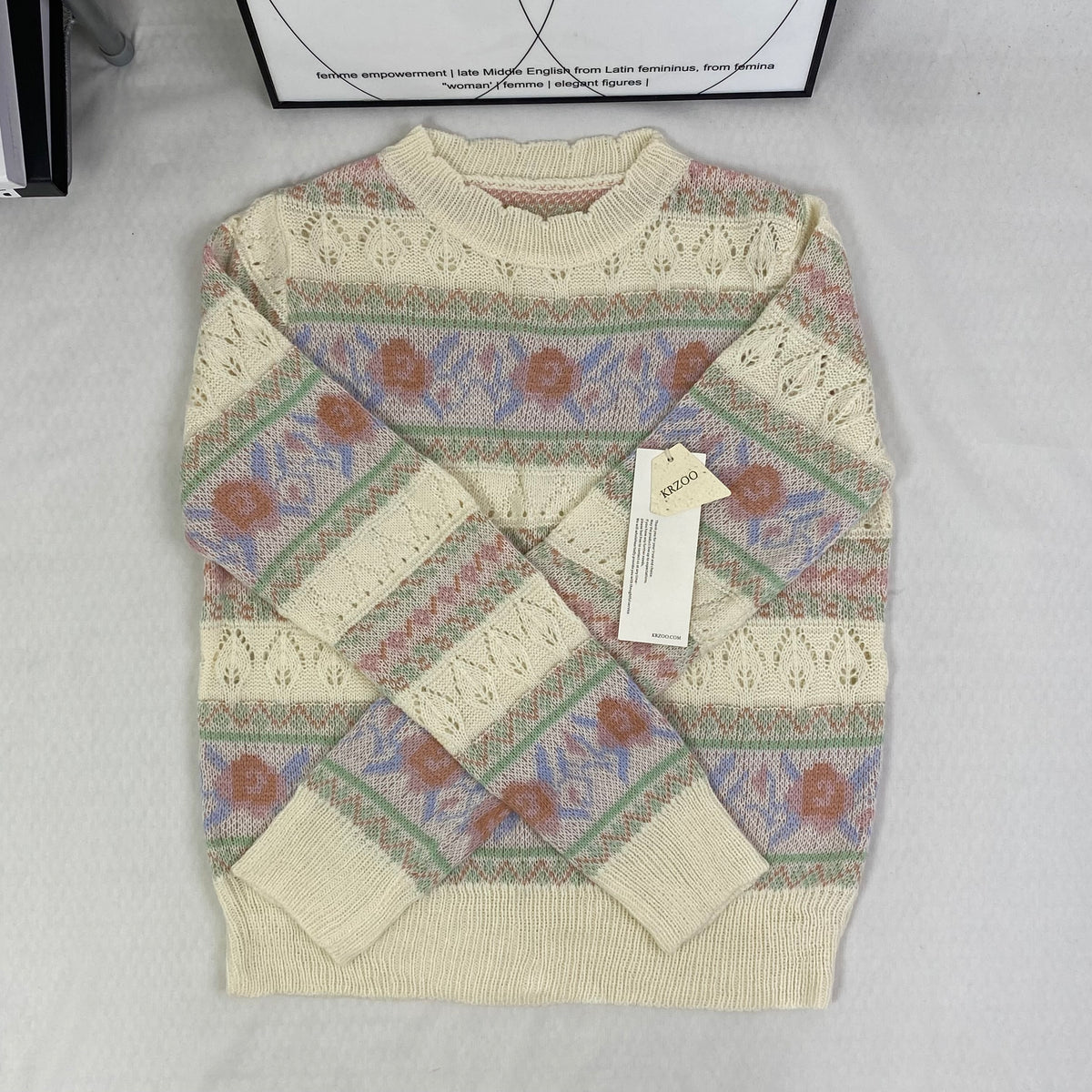 Openwork knitted sweater with patchwork top