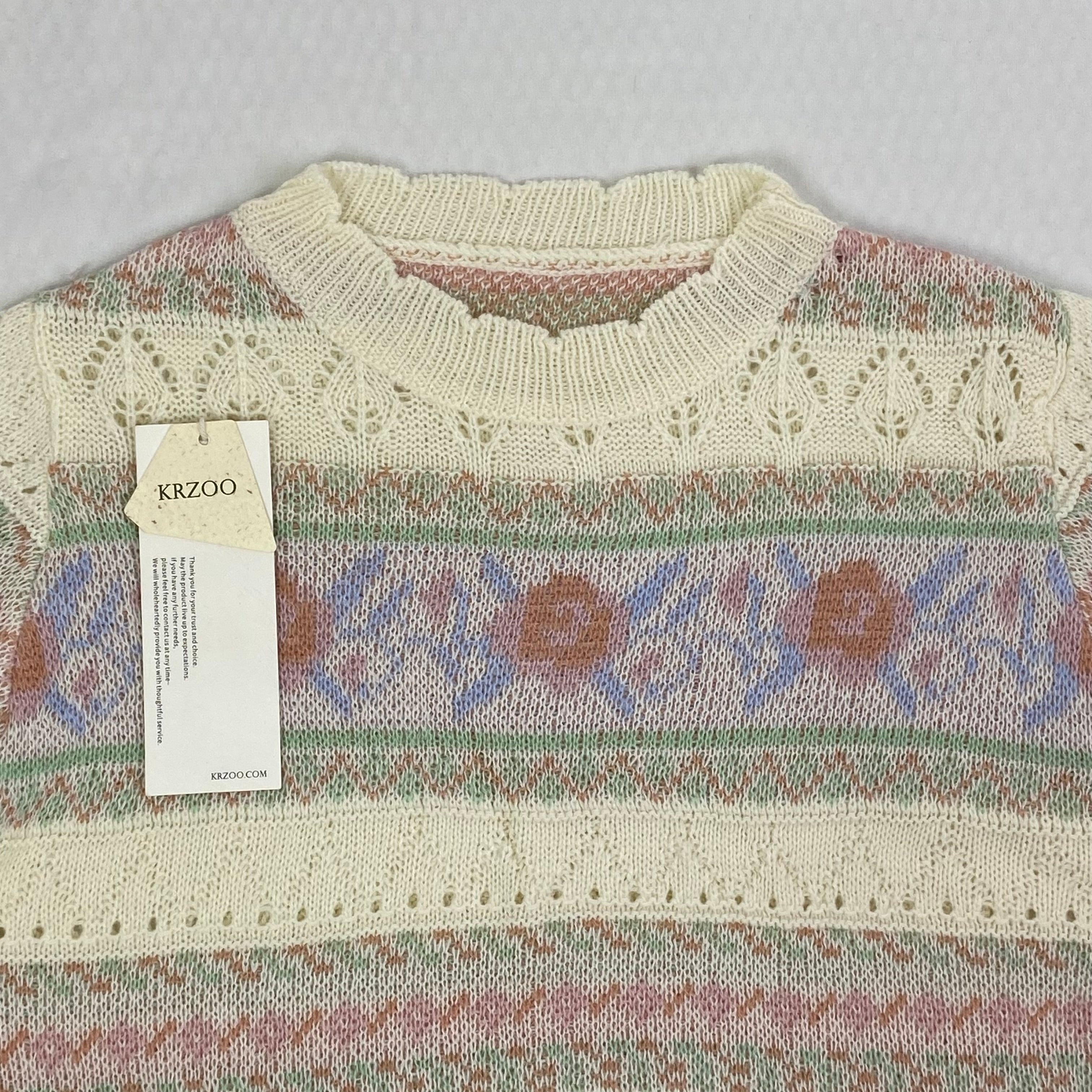 Openwork knitted sweater with patchwork top