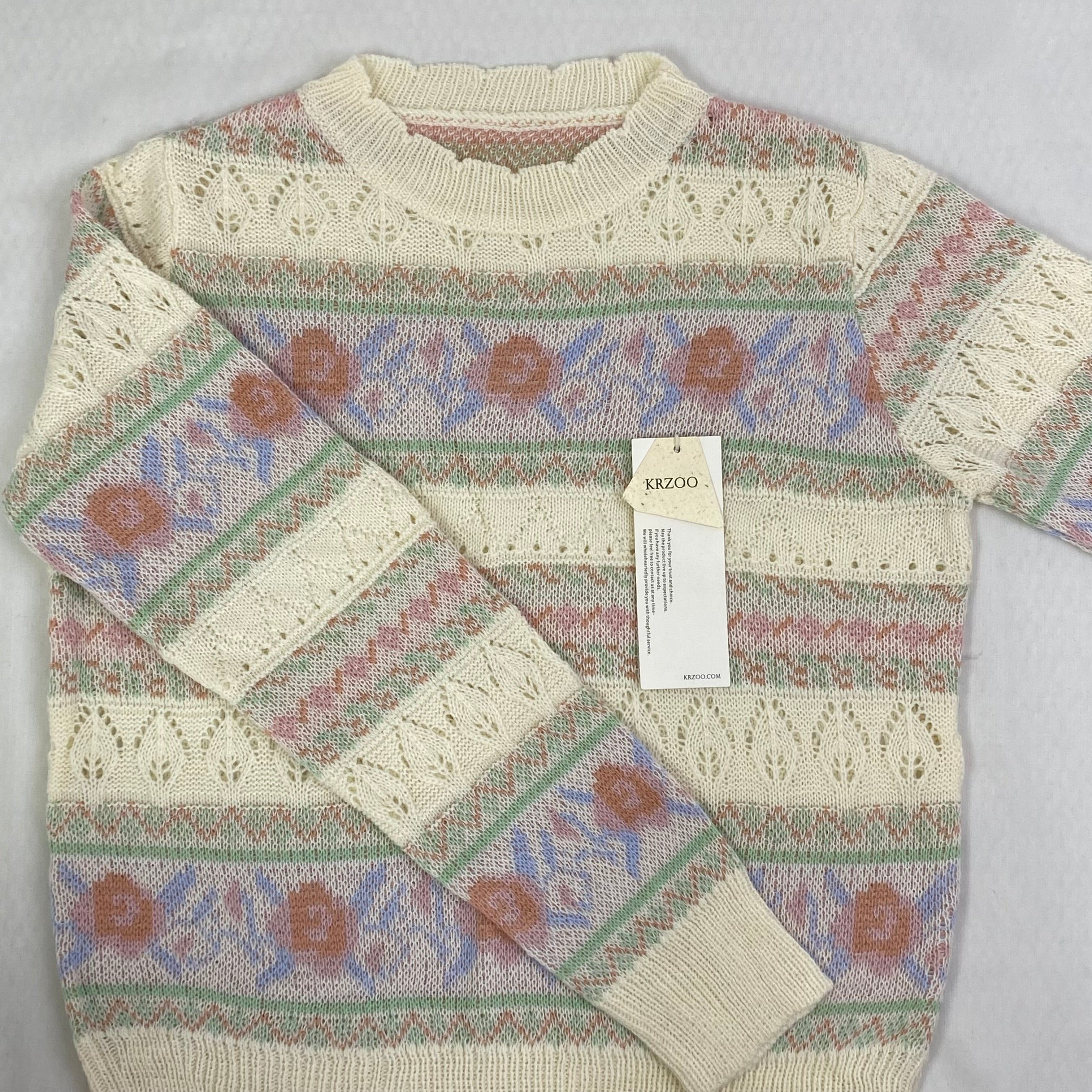 Openwork knitted sweater with patchwork top