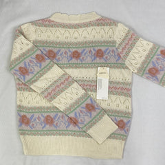Openwork knitted sweater with patchwork top