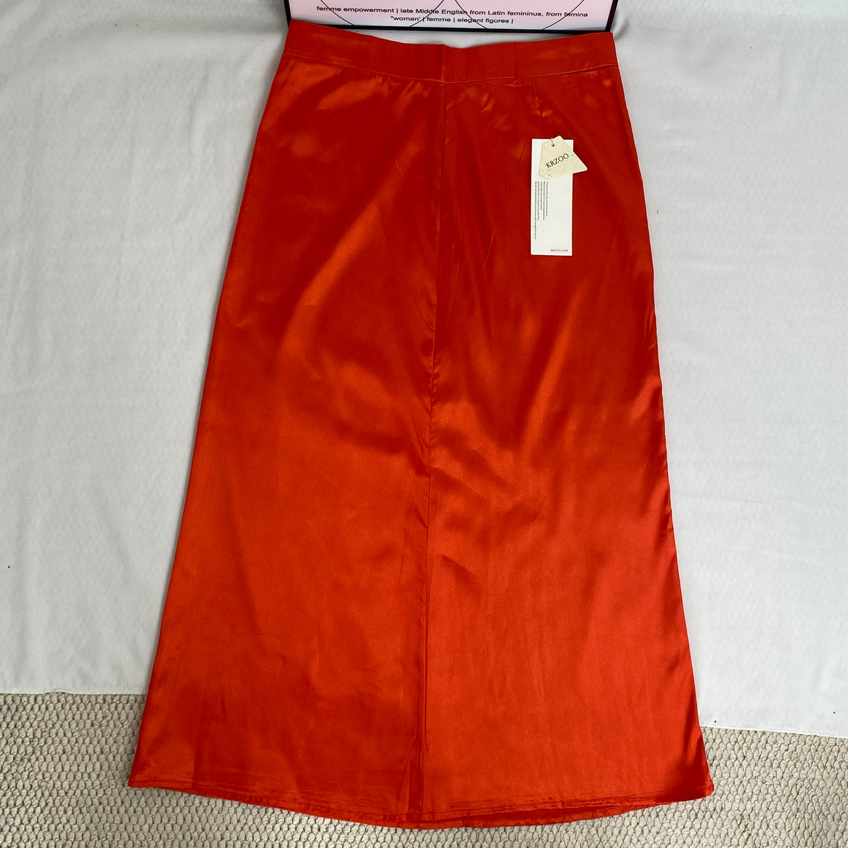 Half-length red A-line skirt