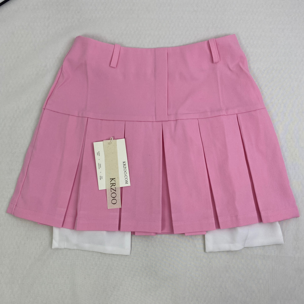 Pleated slit pocket mini skirt