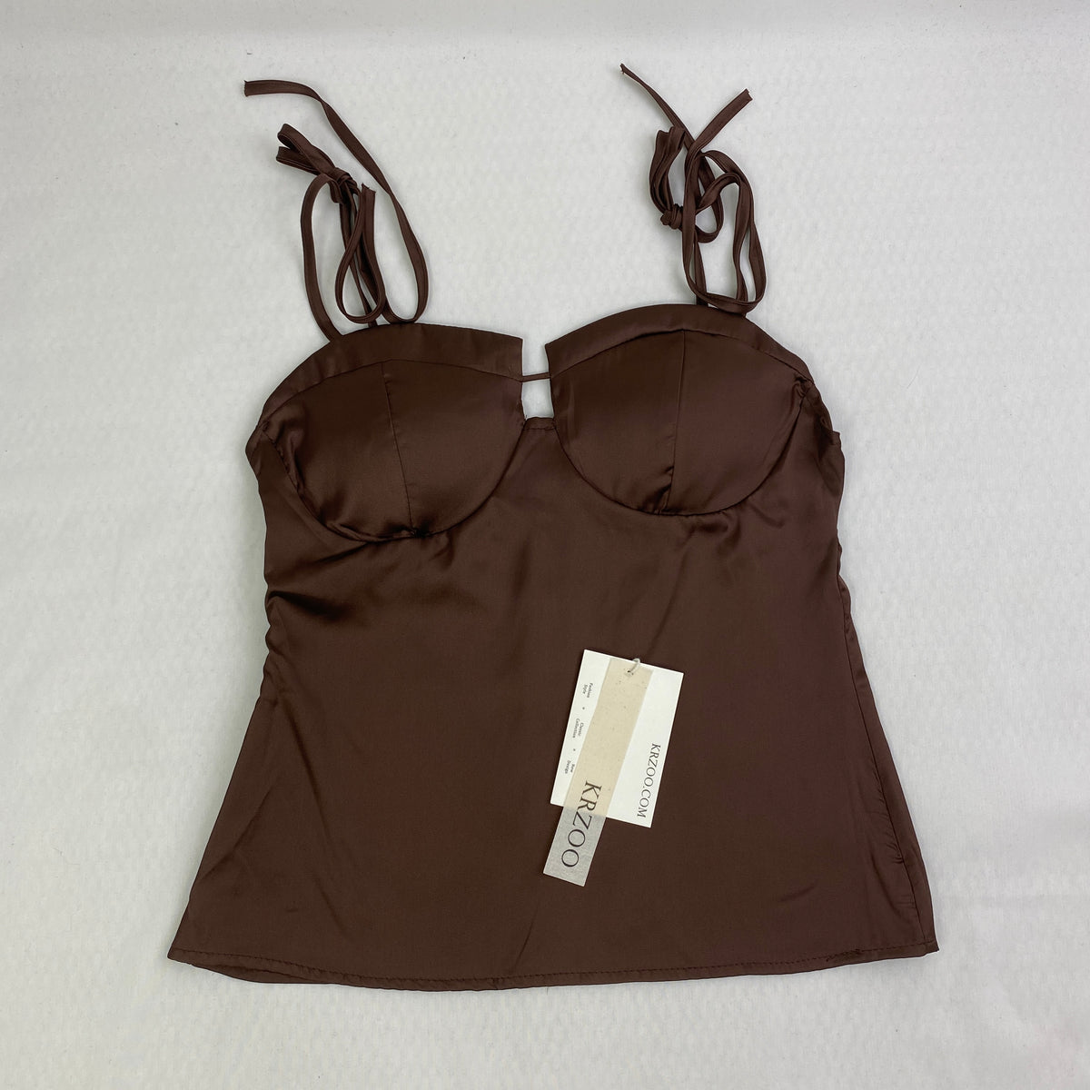Strapless racerback crop top with a fitted waist design