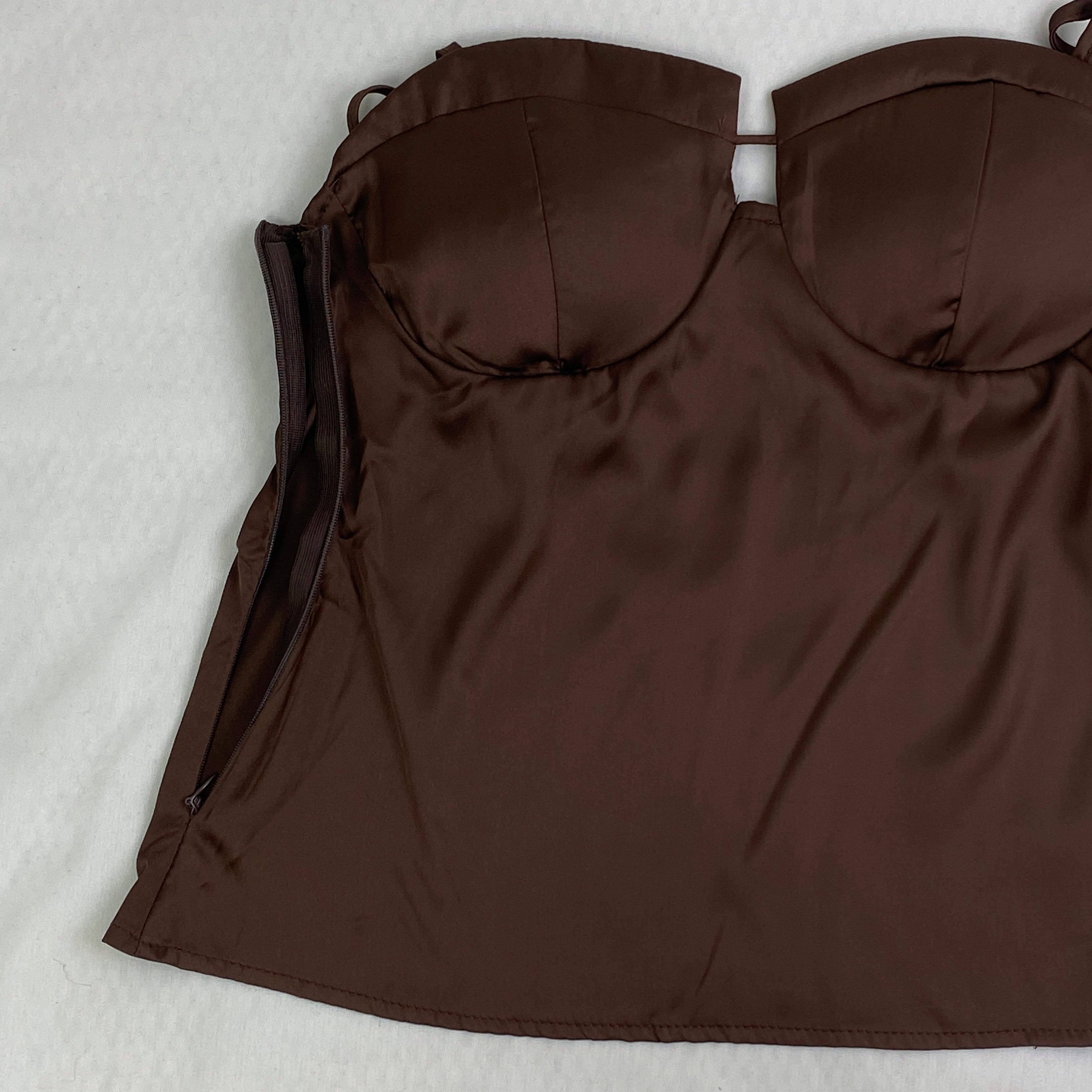Strapless racerback crop top with a fitted waist design
