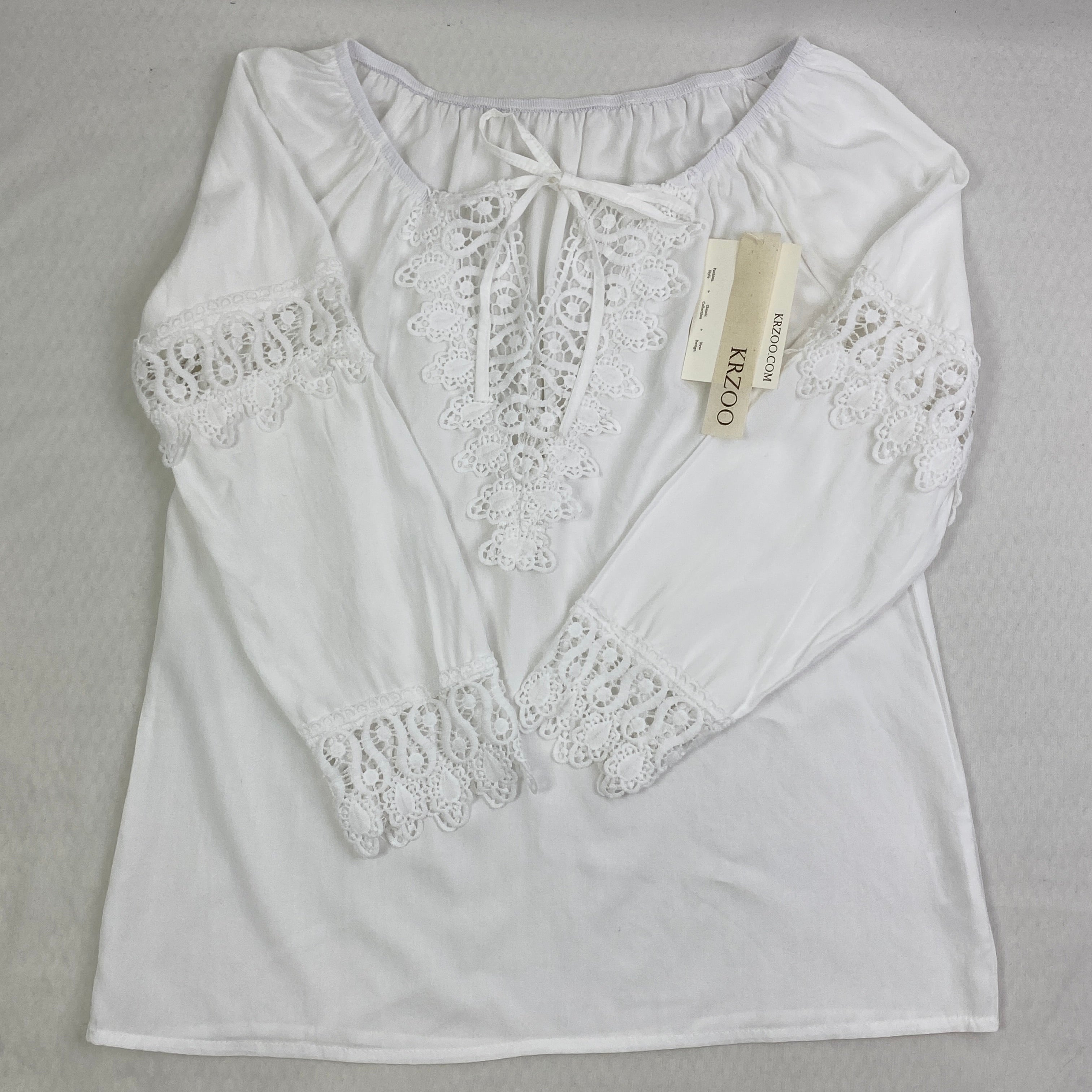 Lace trimmed long-sleeved shirt
