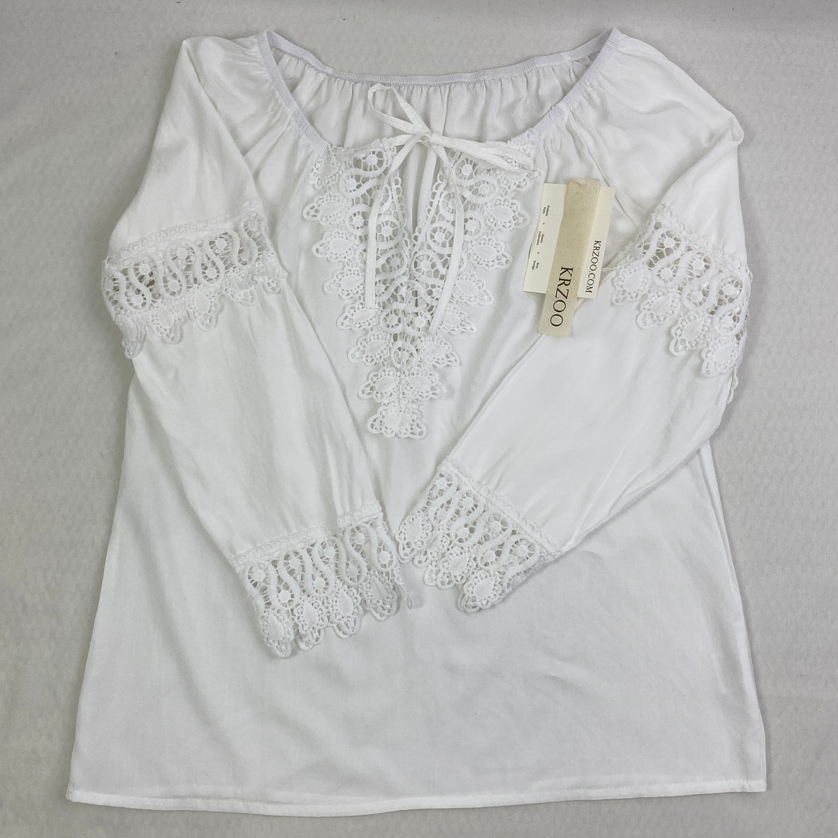 Lace trimmed long-sleeved shirt