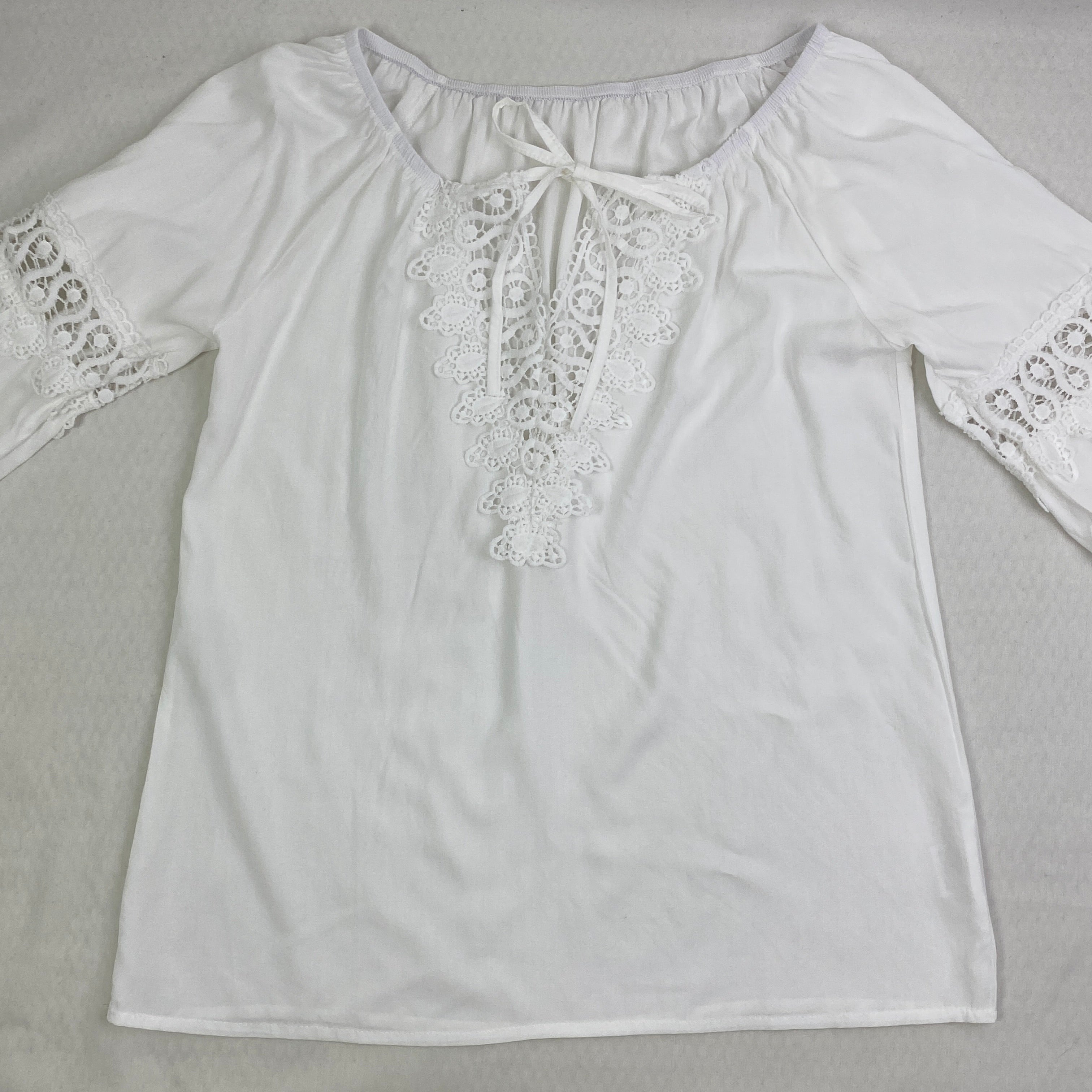 Lace trimmed long-sleeved shirt