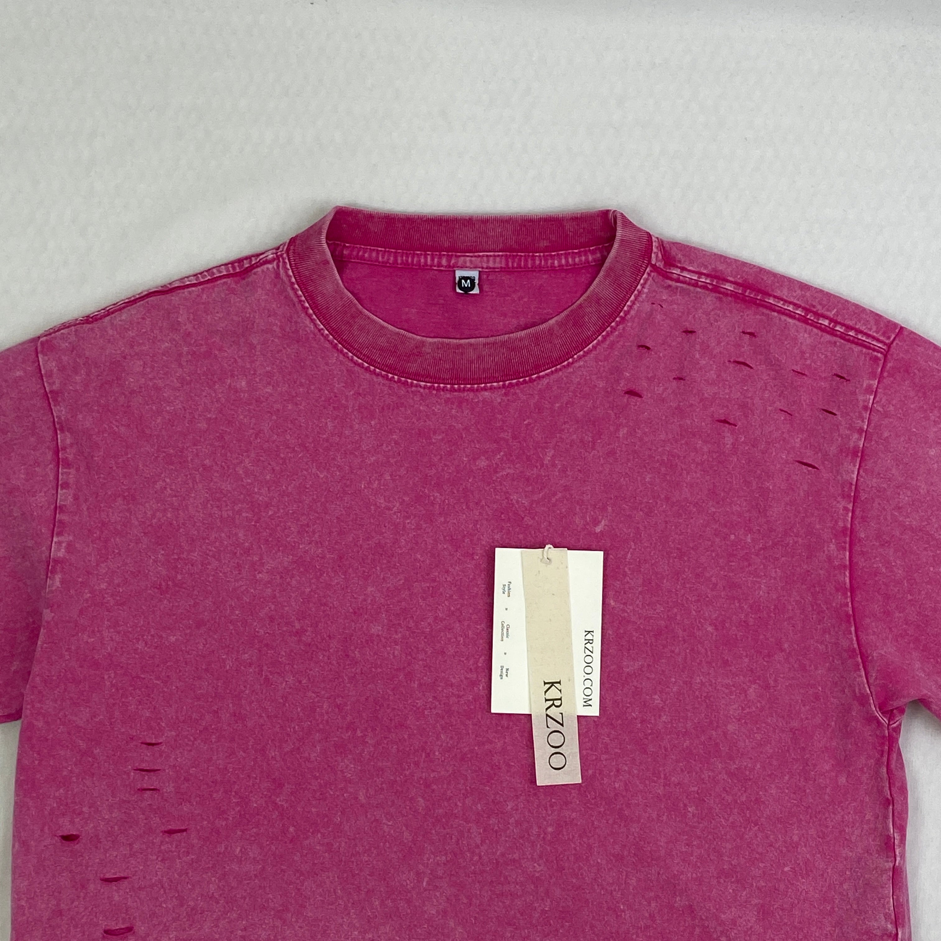 Washed and distressed cotton short-sleeved t-shirt