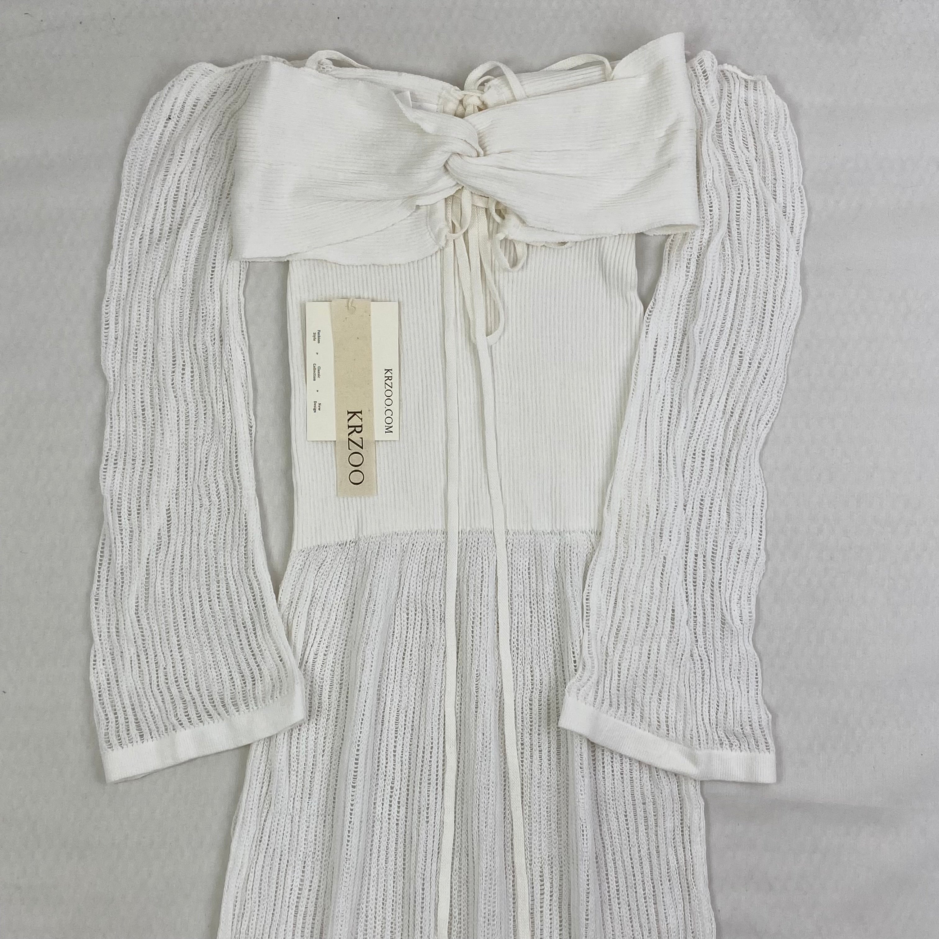 White knitted pullover sleeveless top