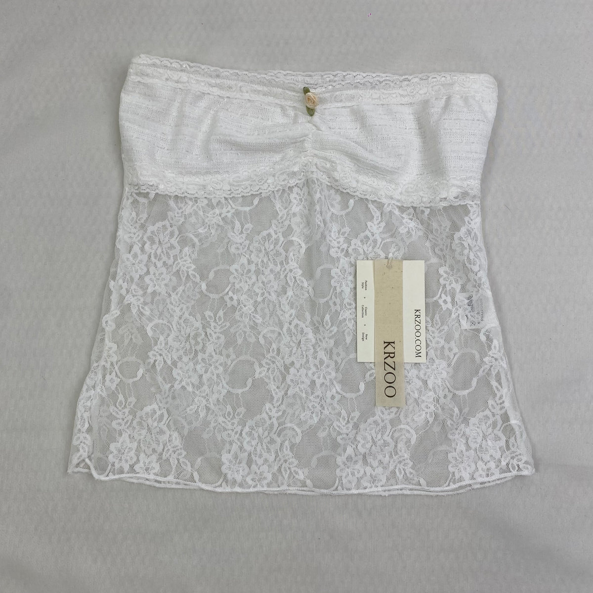 Lace strapless lace-up top with ruffled neckline
