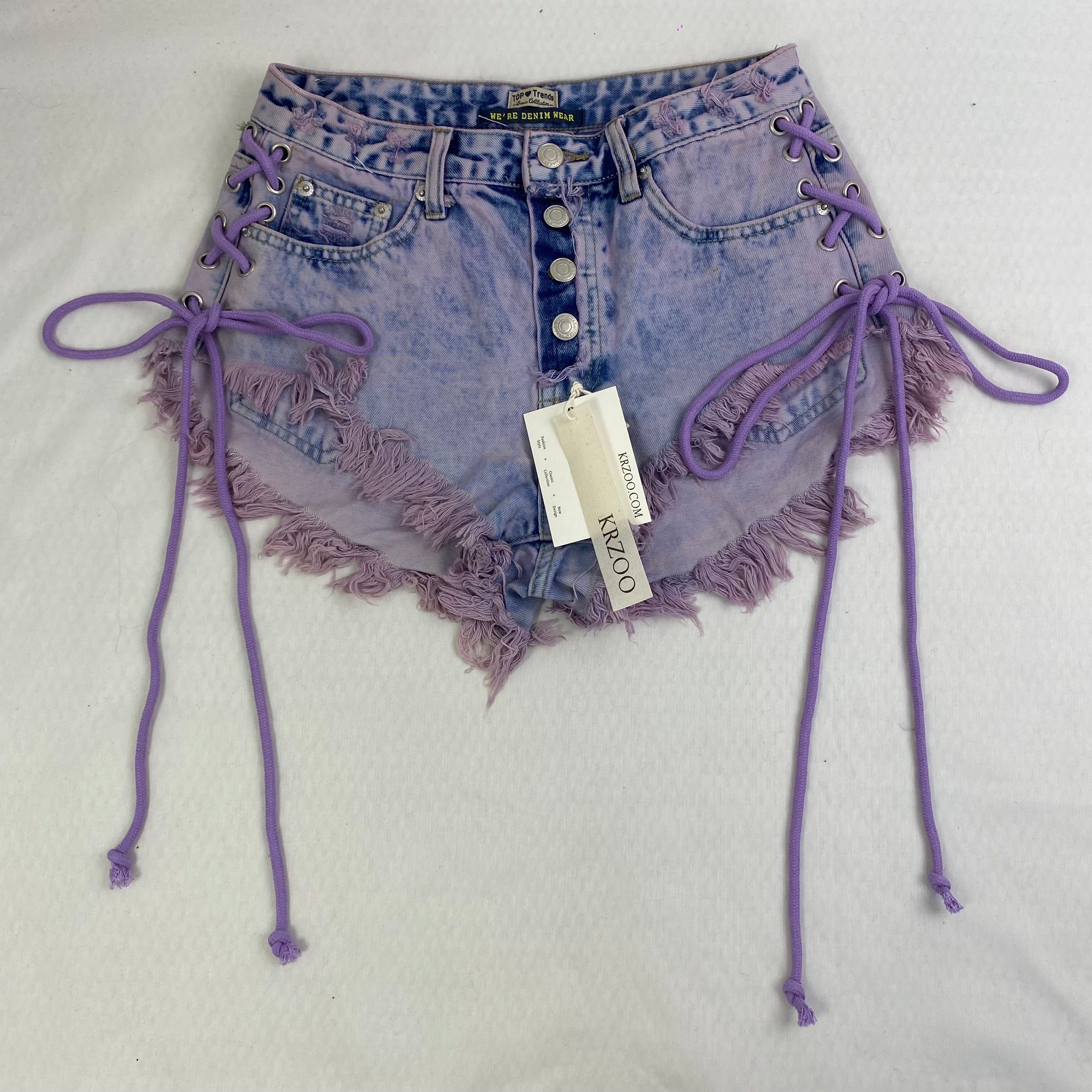 Purple strapped buttoned fringed shorts