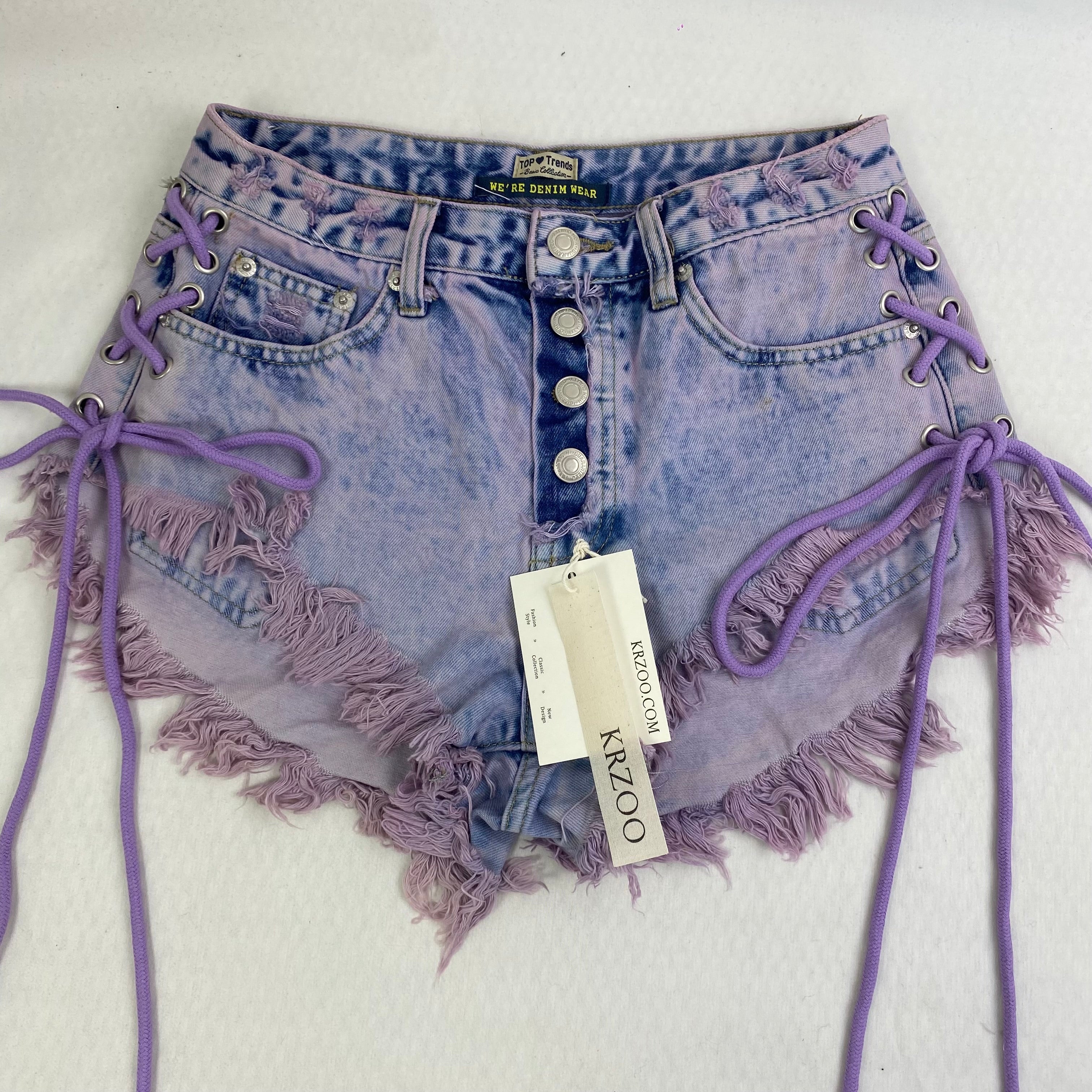 Purple strapped buttoned fringed shorts