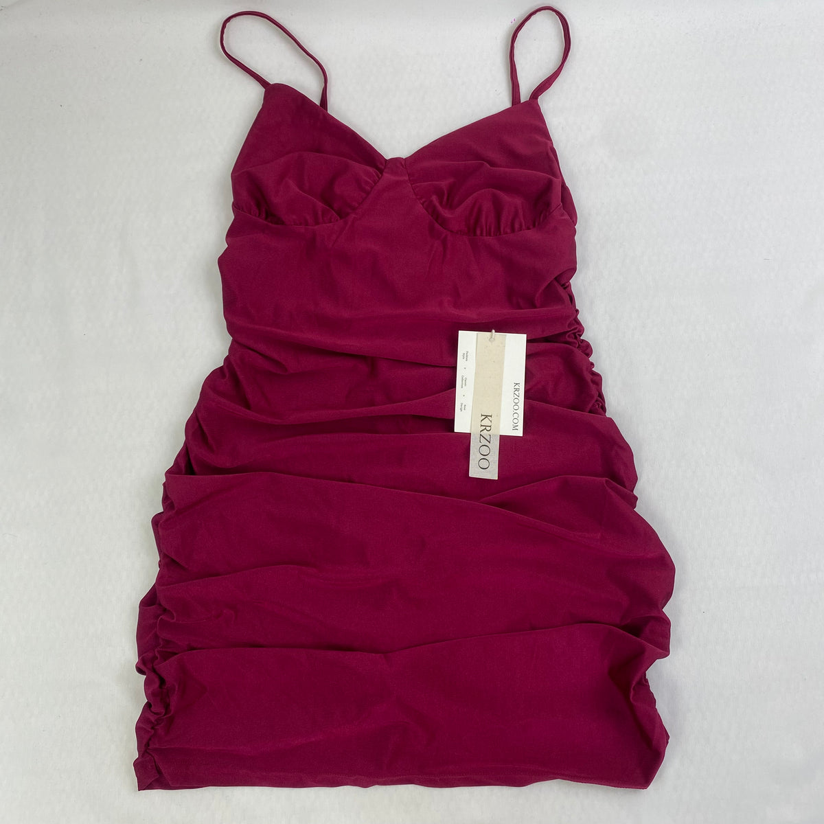 Low-neck pleated dress